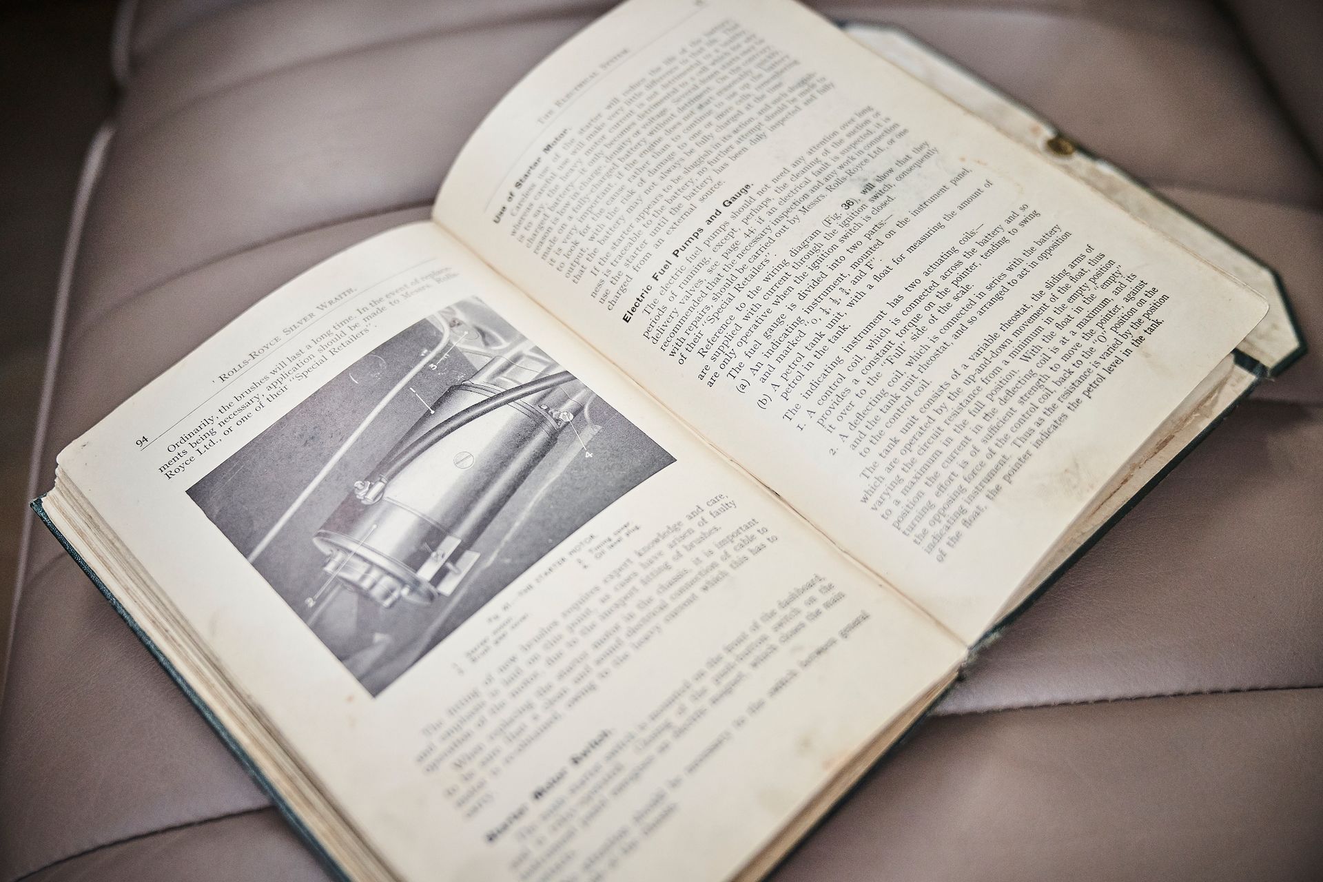 A book is open to a page with a picture on it