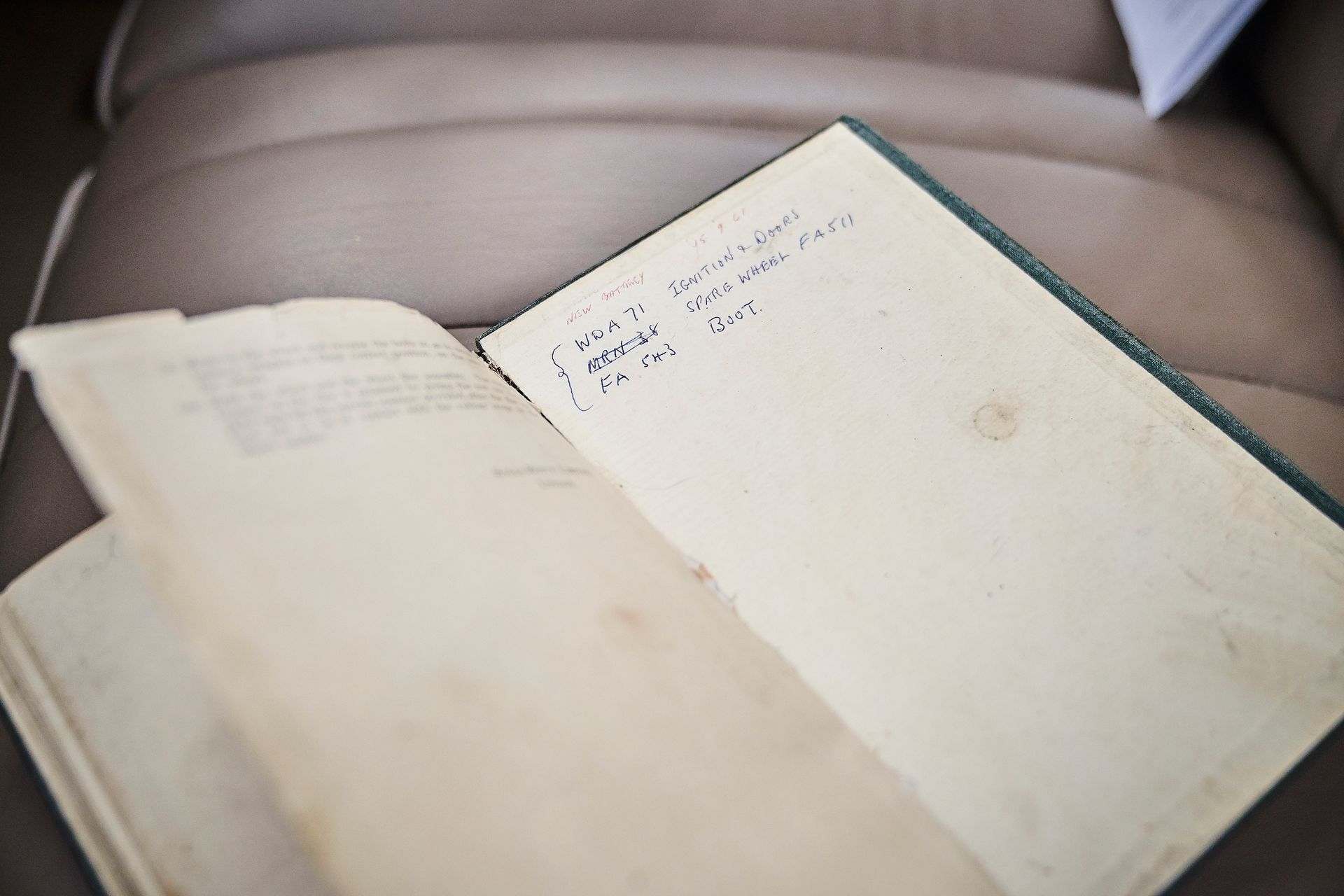 A book is open to a page with writing on it