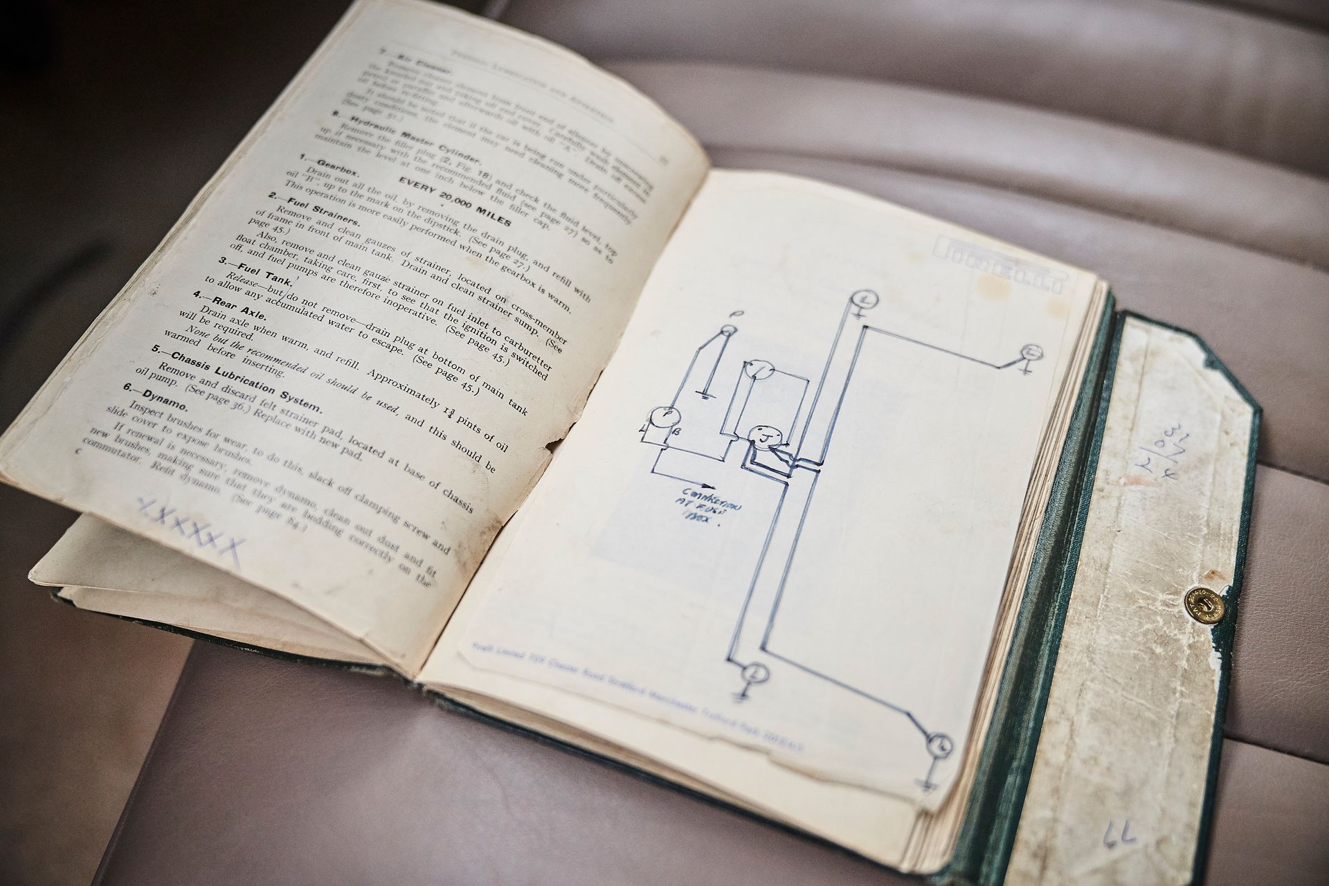A book is open to a page with a drawing on it.