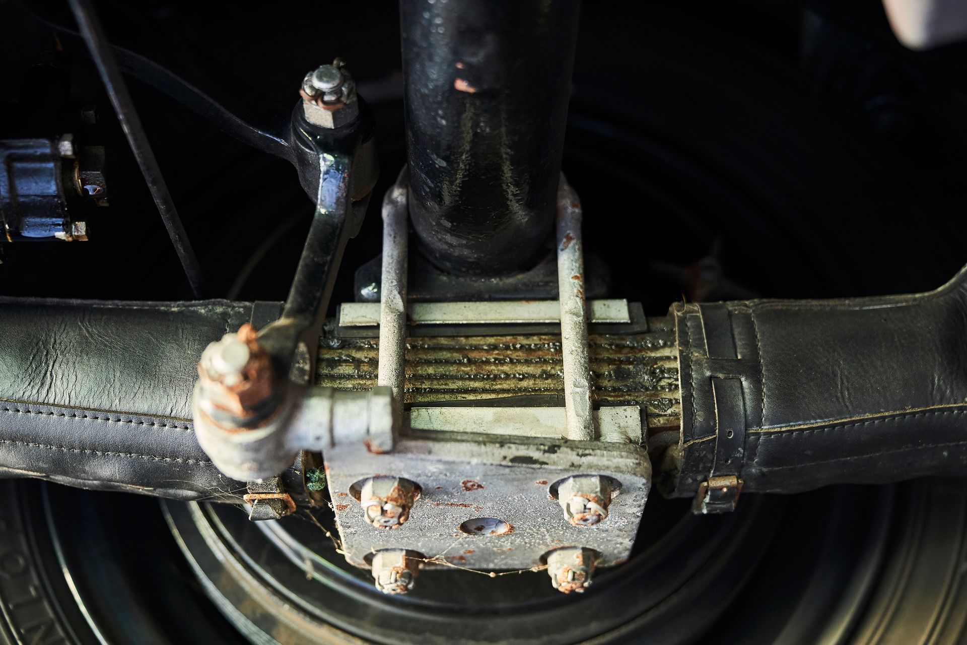 A close up of a steering wheel on a car
