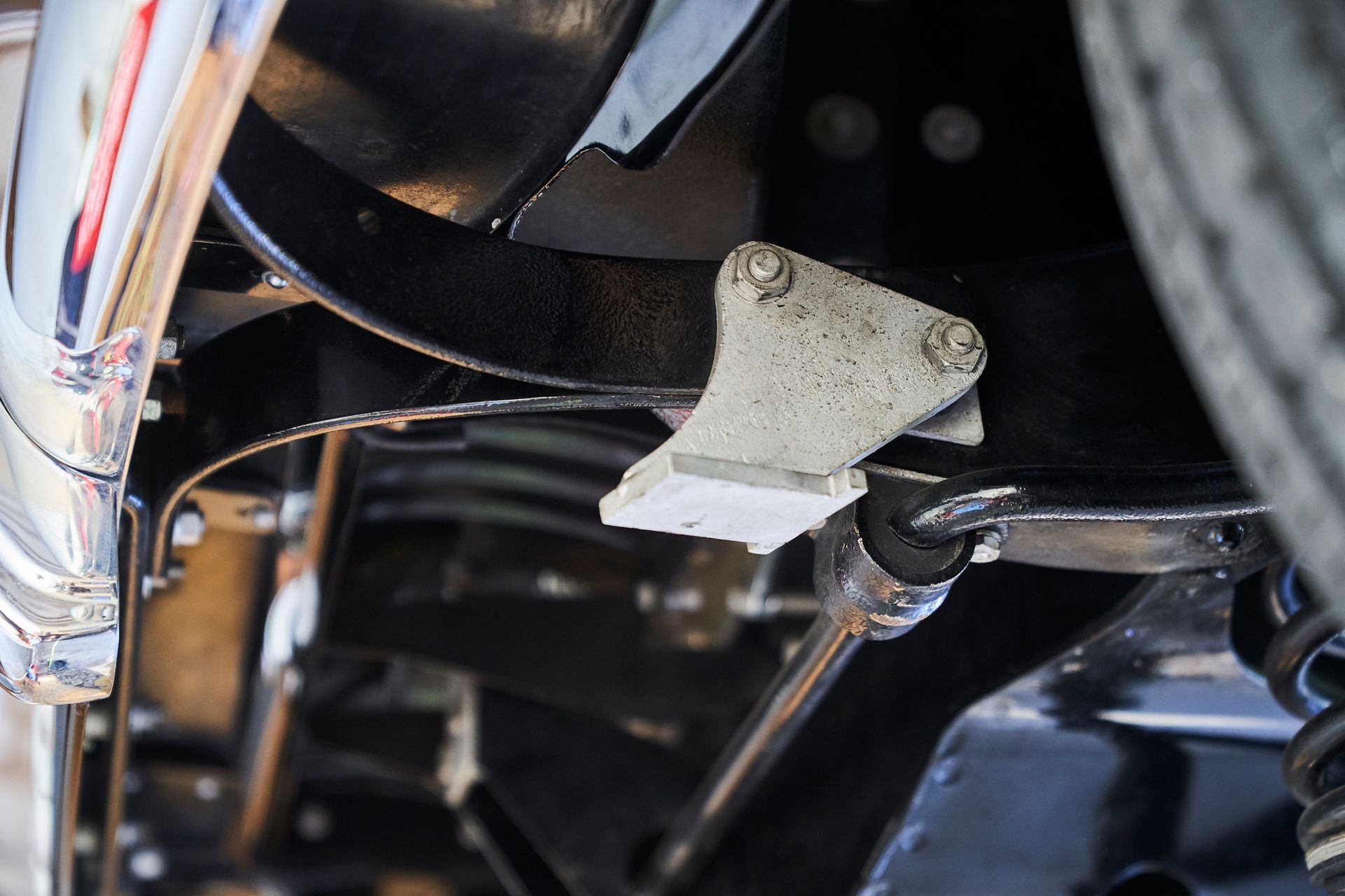 A close up of the underside of a car.
