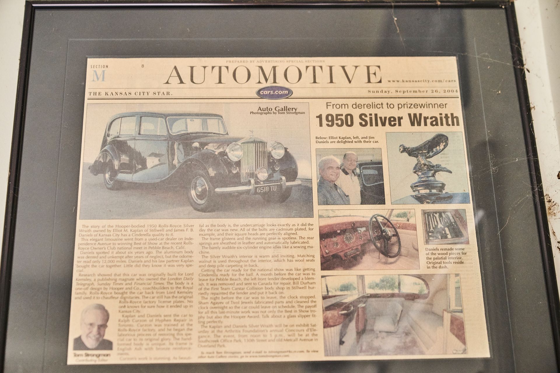 A framed newspaper article about the 1950 silver wraith