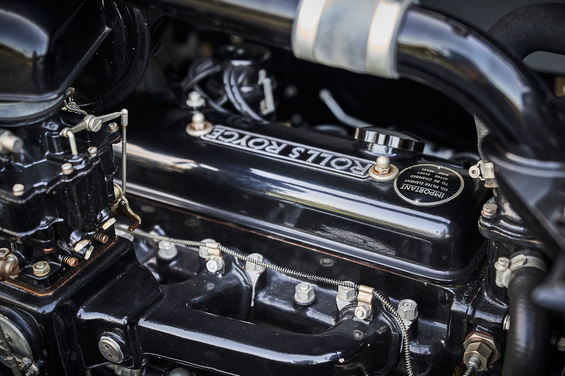 A close up of a black engine with the word ignition on it