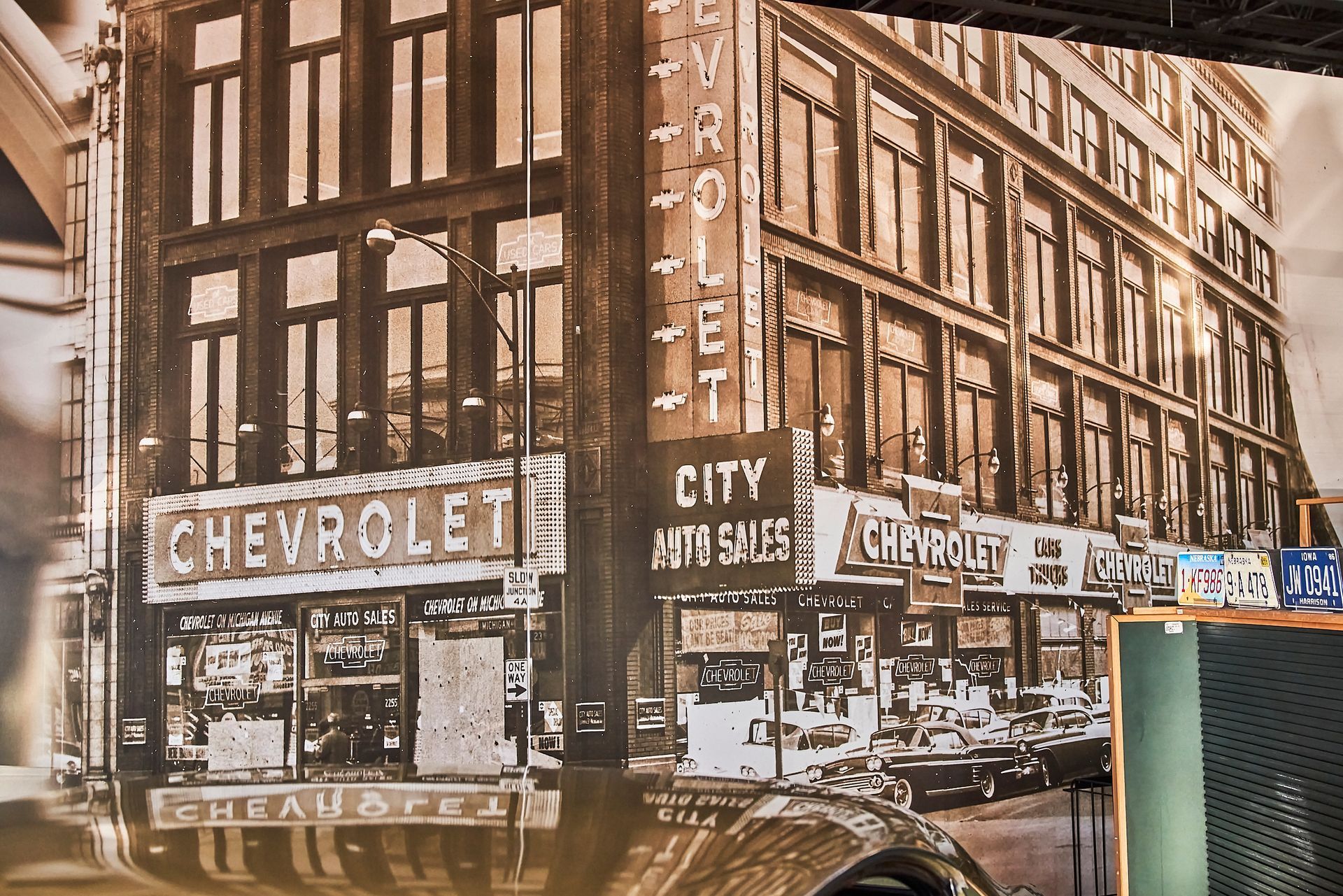 A black and white photo of a chevrolet store