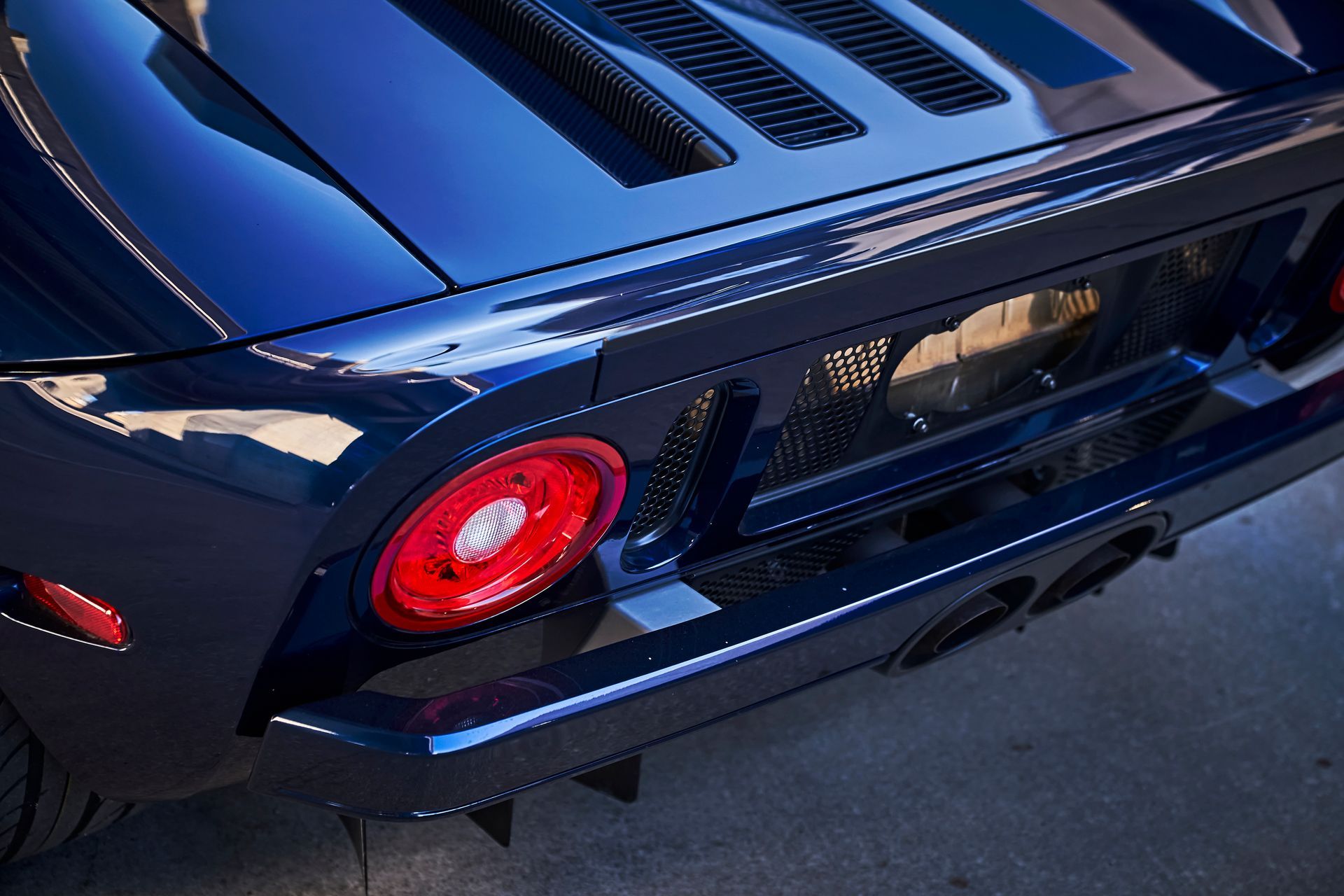 2006 Ford GT -A close up of the rear end of a blue sports car