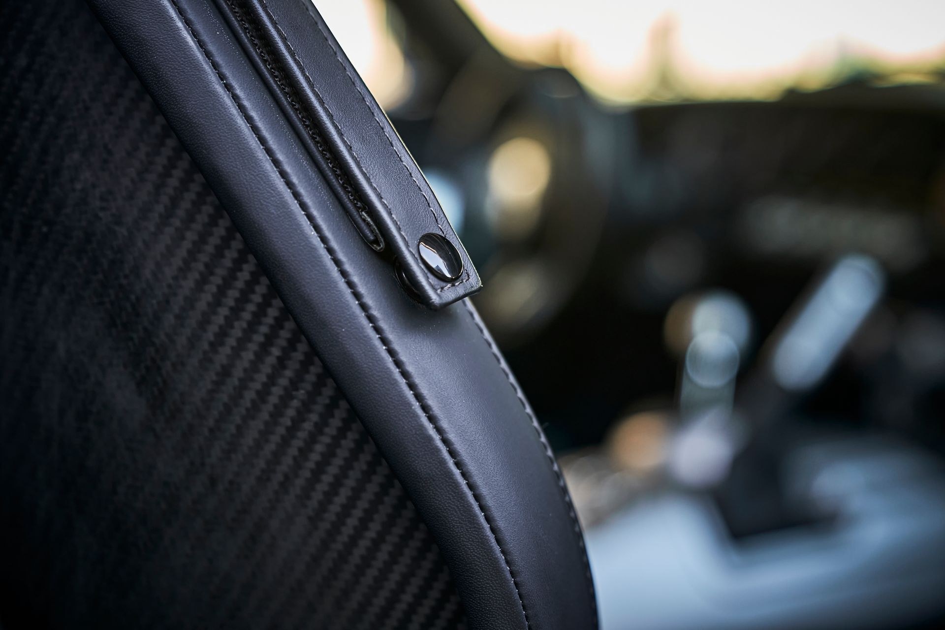 A close up of a seat belt in a car