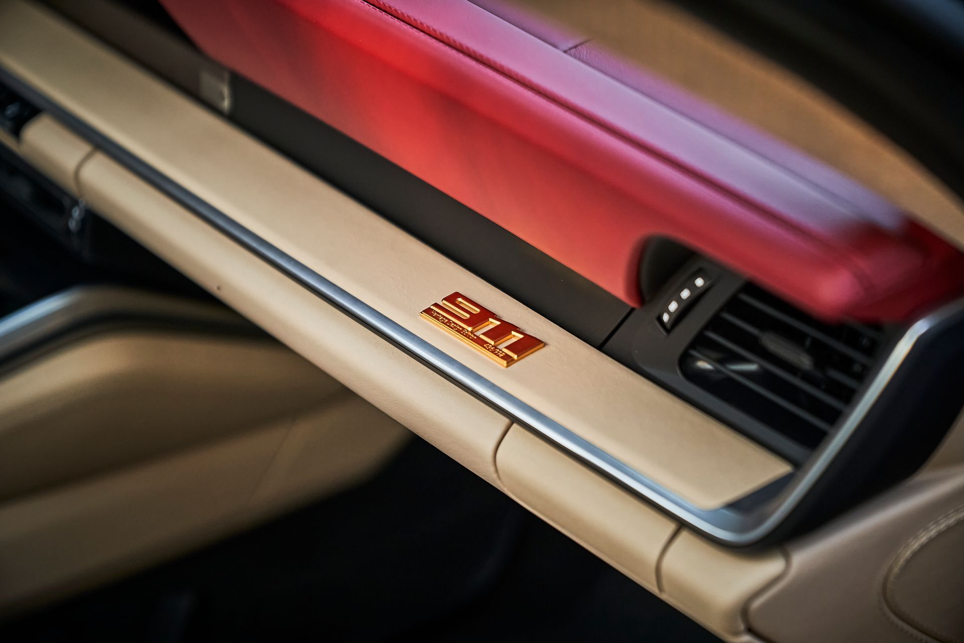 A close up of the dashboard of a porsche 911