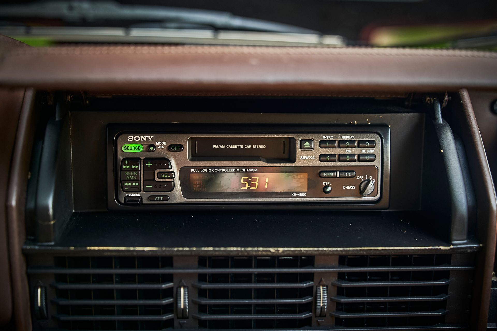 A car radio with the time 5:31 on it