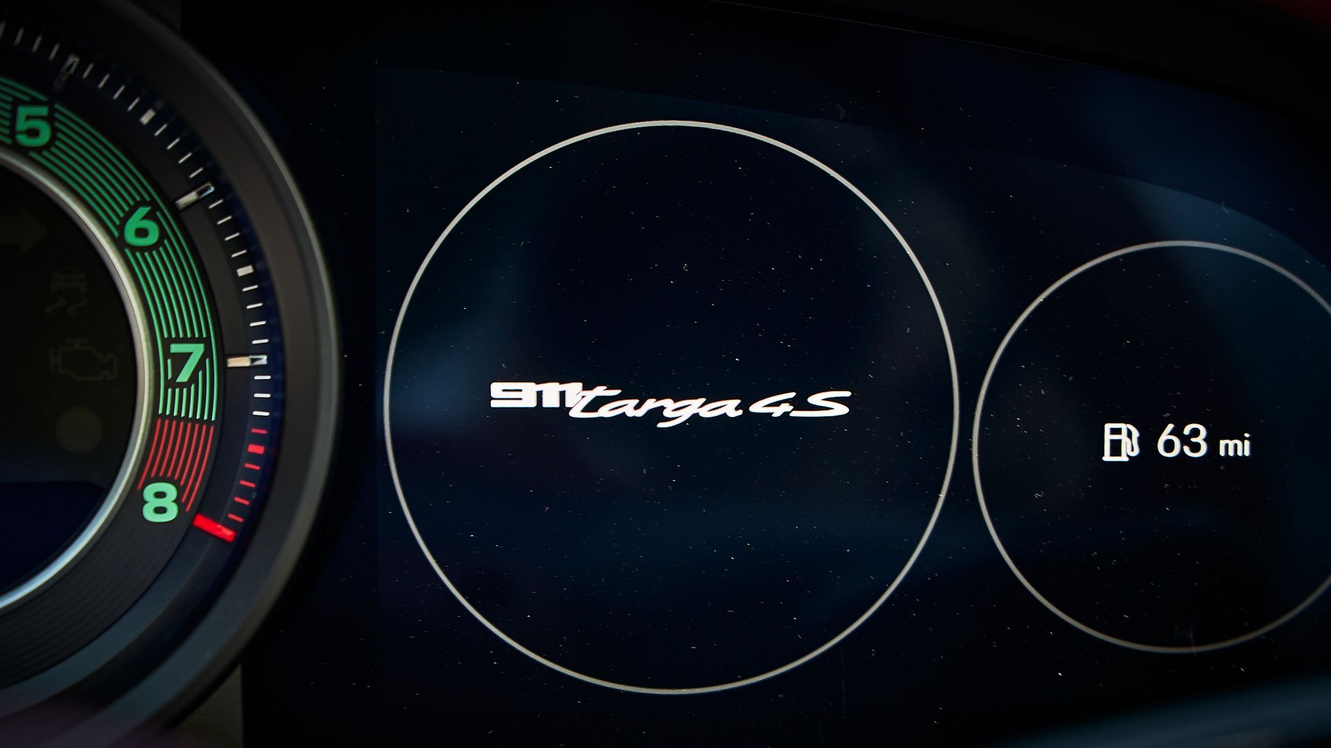 A car dashboard with the word targa on it