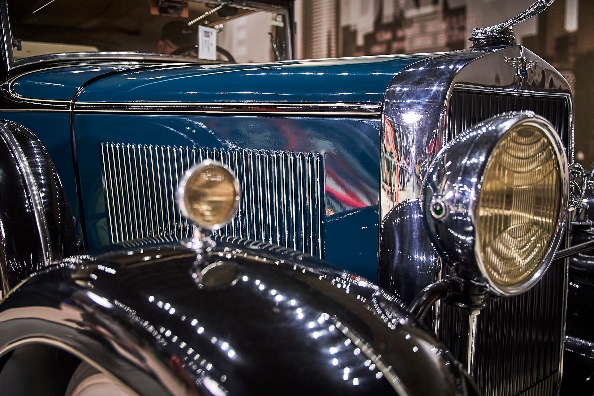 A close up of the front of an old car