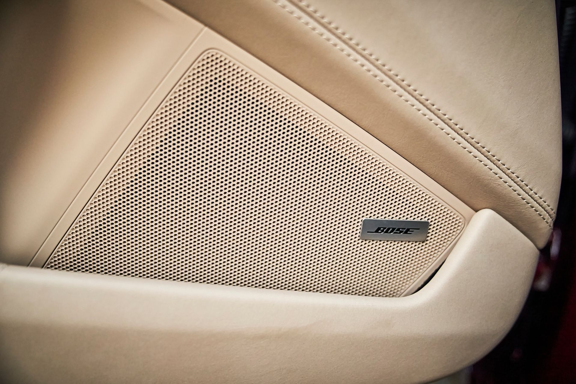 A close up of a bose speaker in a car