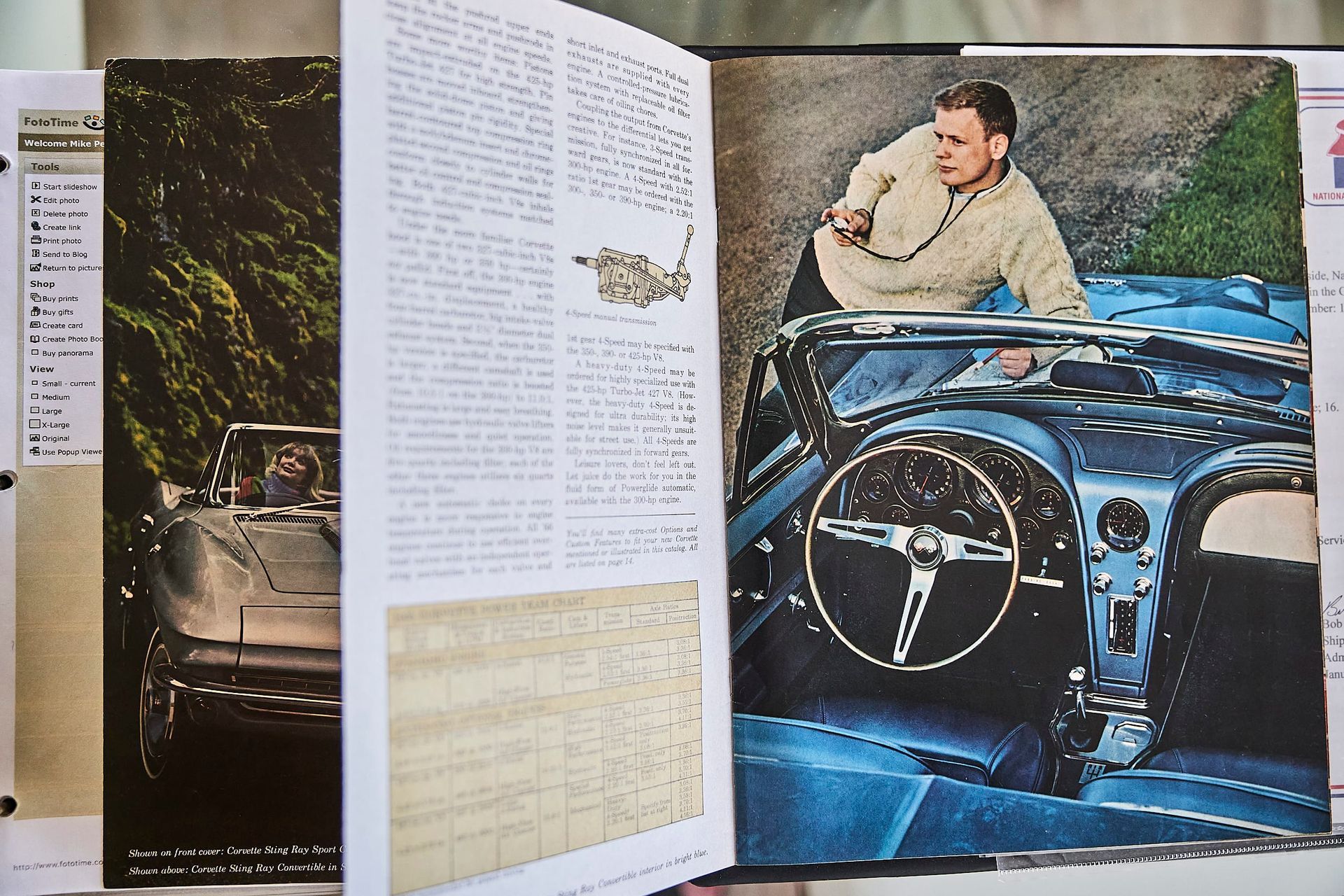 Open book with car photos and text. A man in a sweater leans on a blue convertible; pages contain text and a silver car photo.