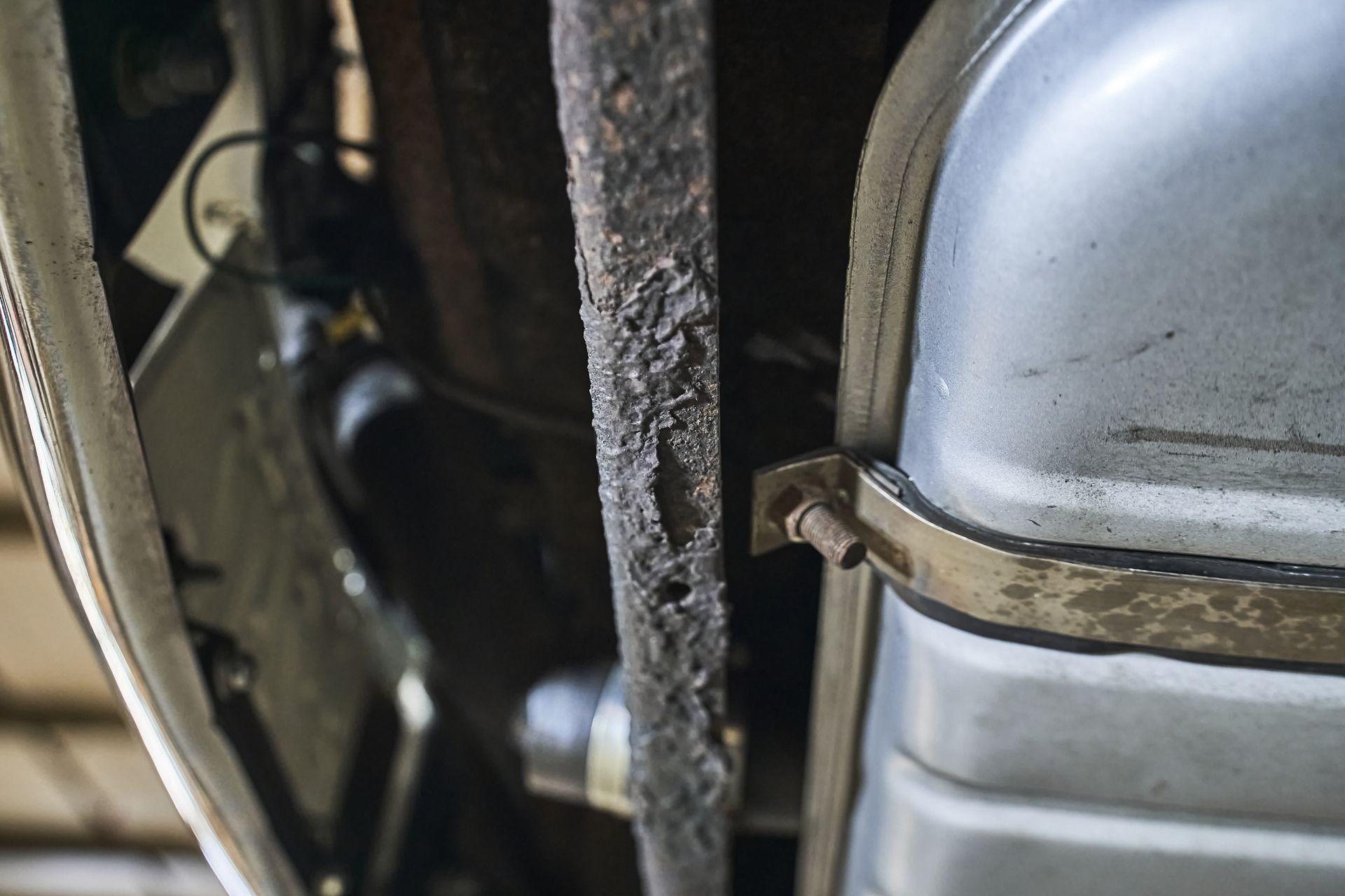 A close up of a exhaust pipe on a car