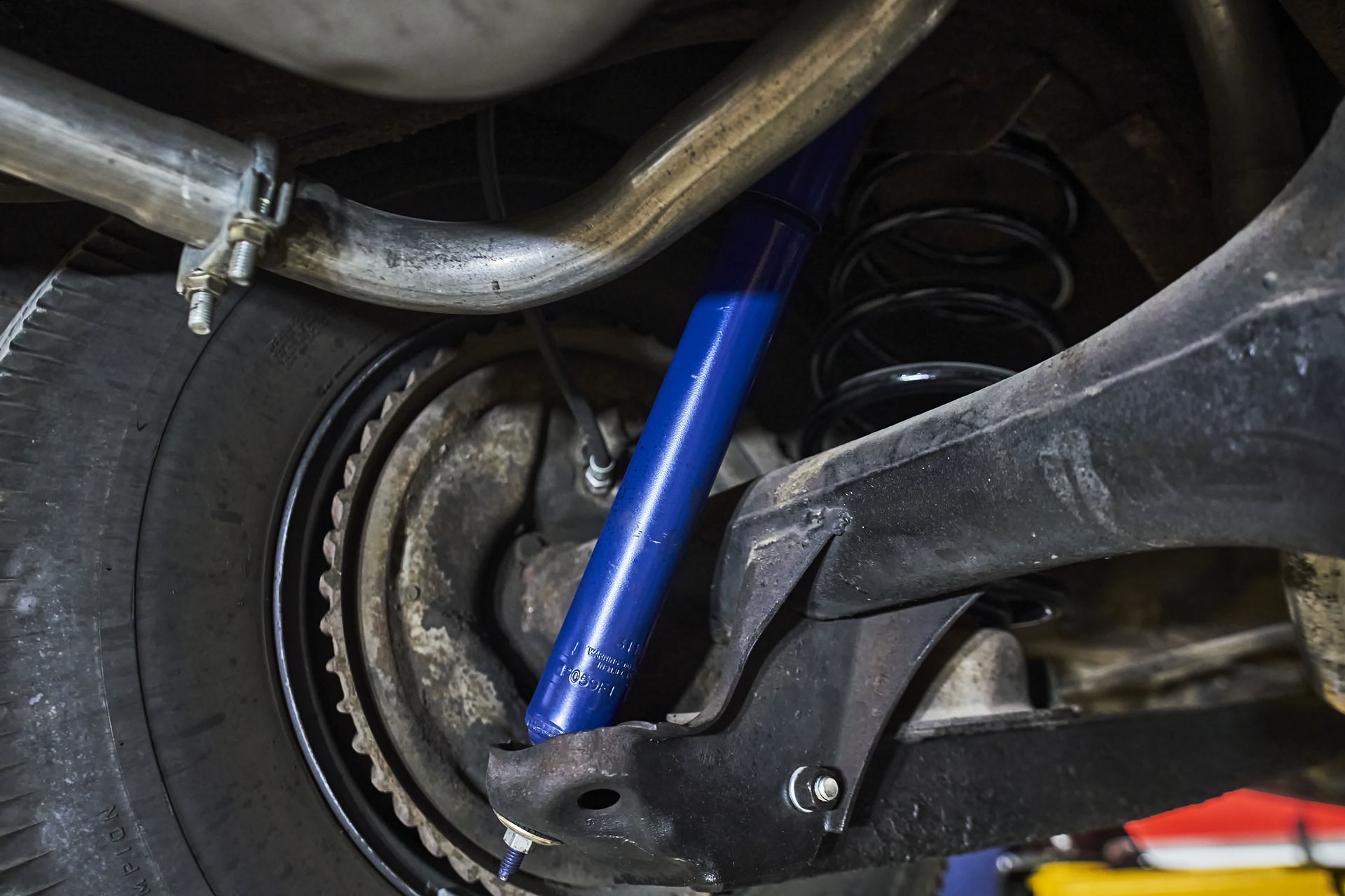 A close up of a shock absorber on a car