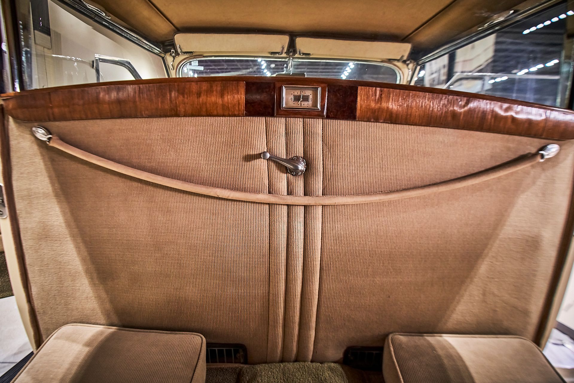 A close up of the back seat of an old car