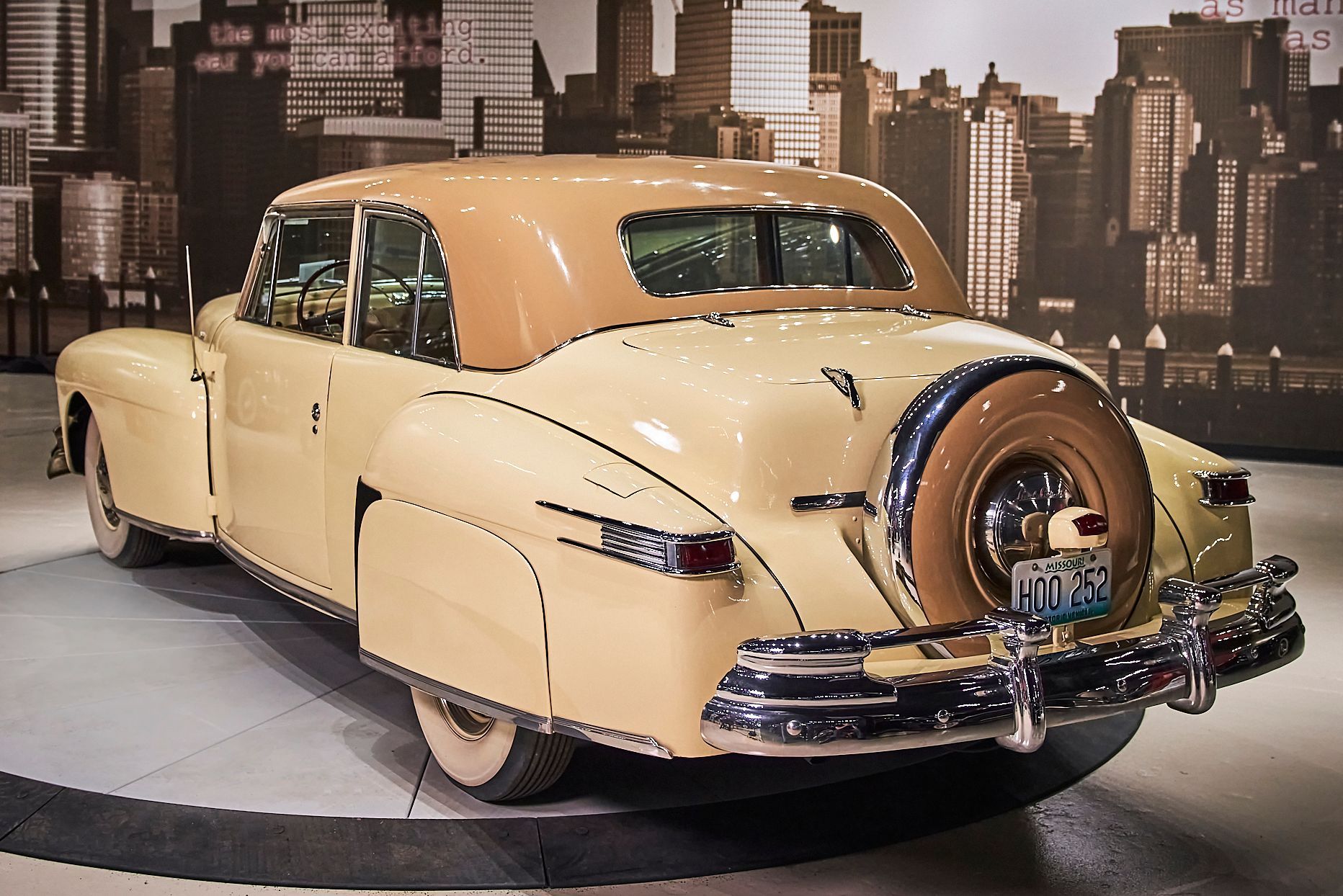 A very old car with a license plate that says ' nc ' on it
