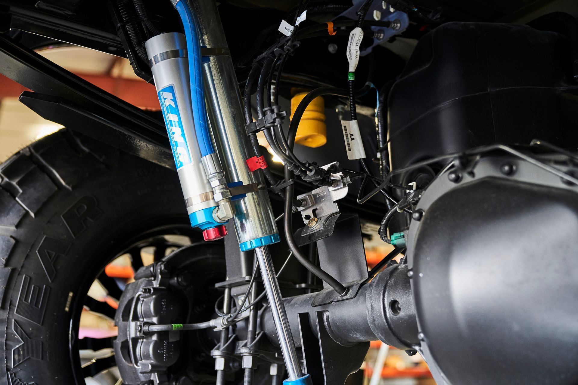 A close up of a suspension system on a truck