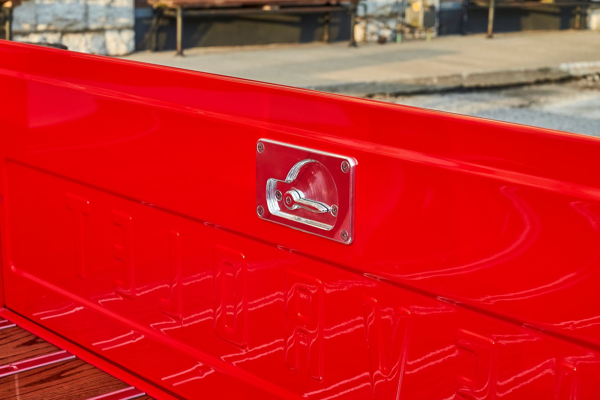 A close up of the back of a red truck.