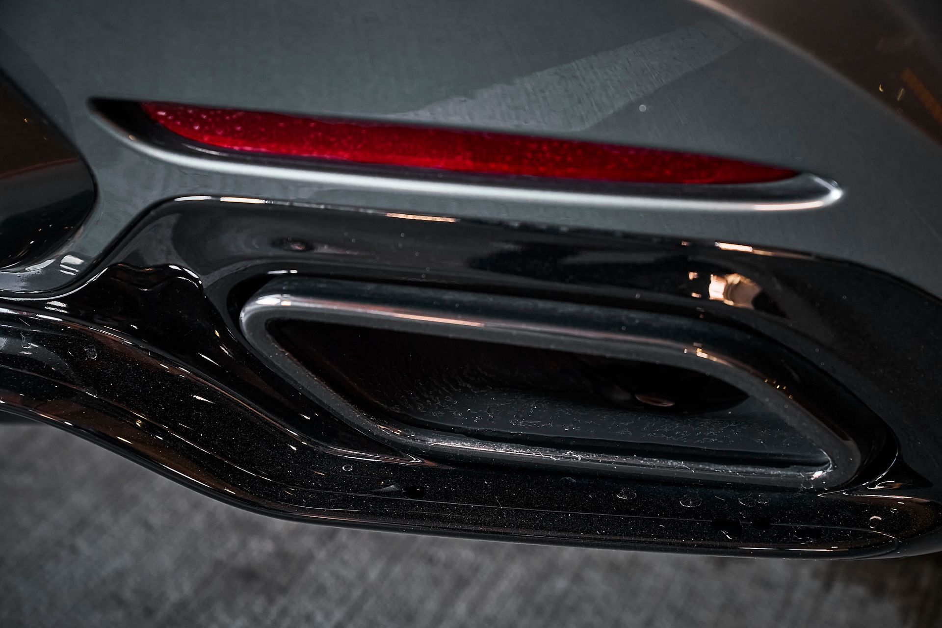 A close up of the exhaust pipe of a car.