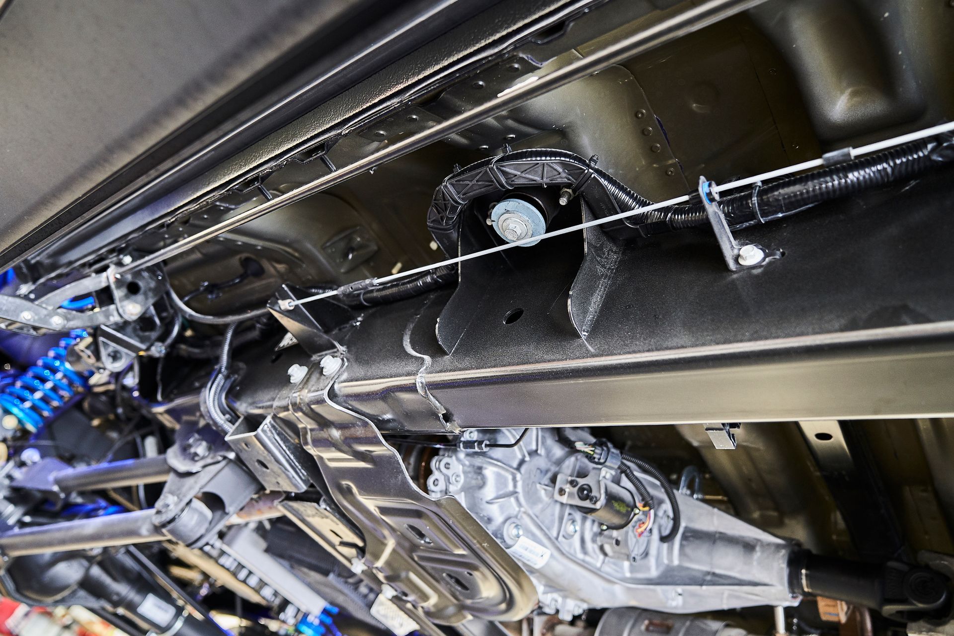 A close up of the underside of a car.