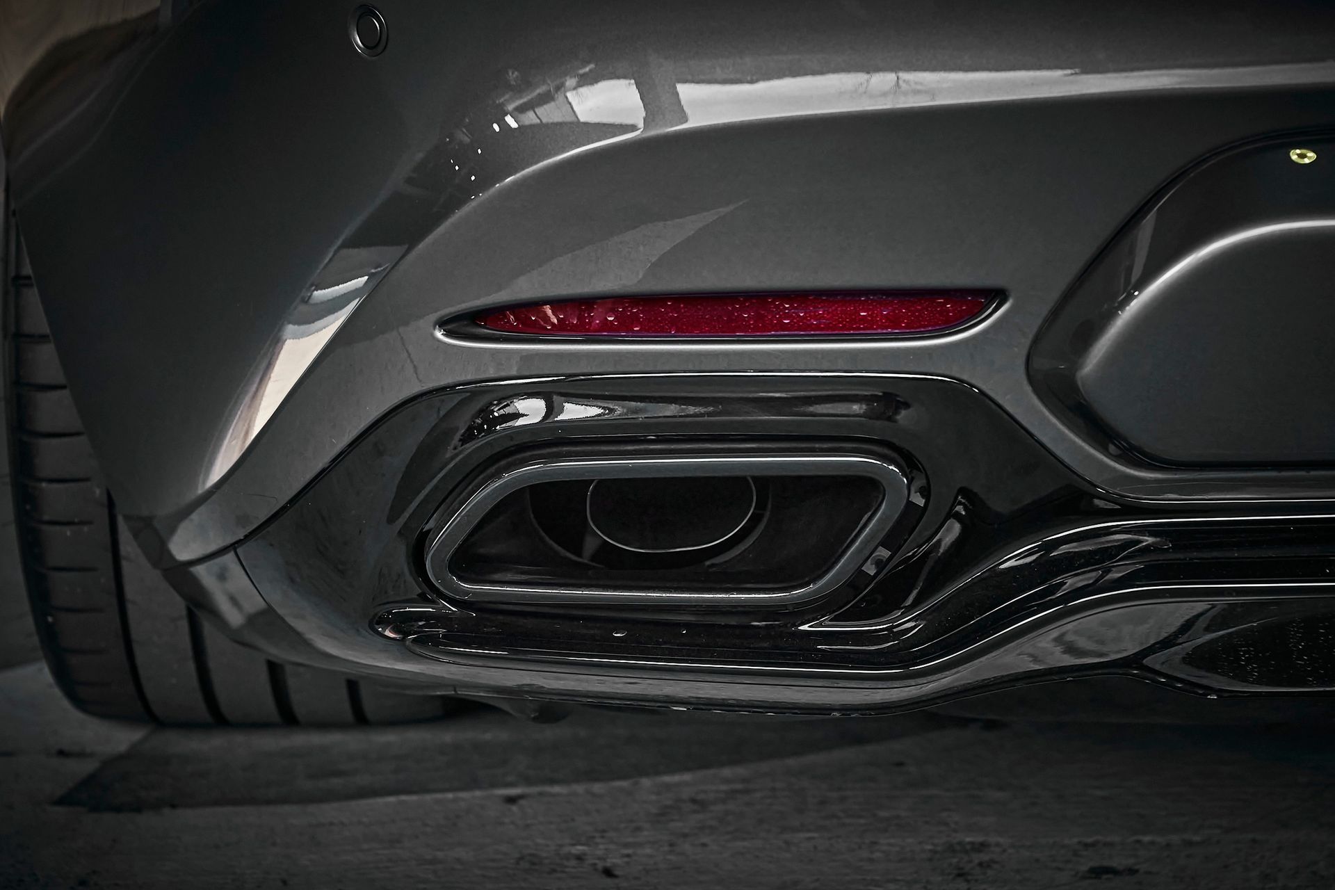 A close up of the exhaust pipe of a car.