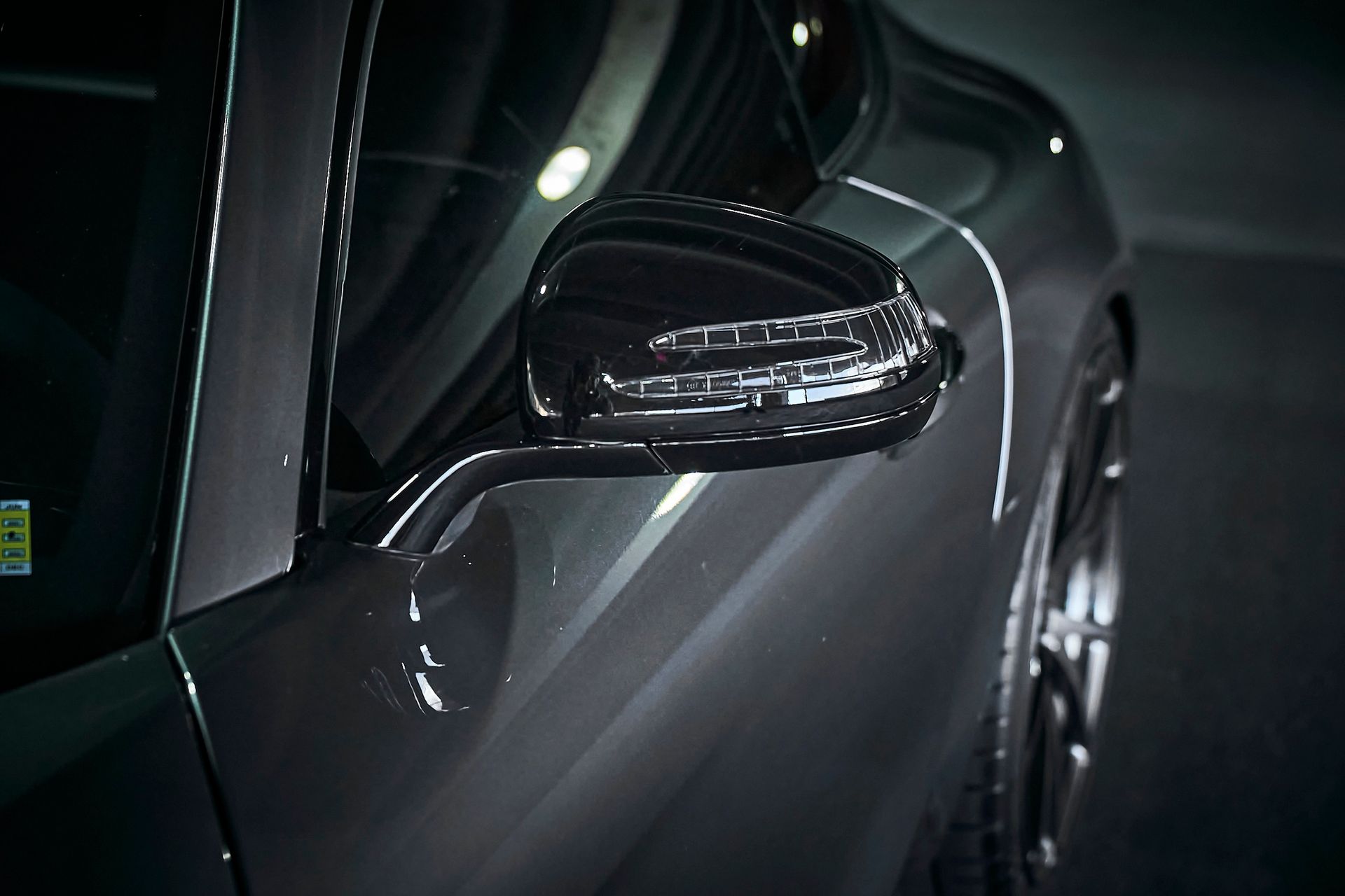 A close up of a car 's side view mirror