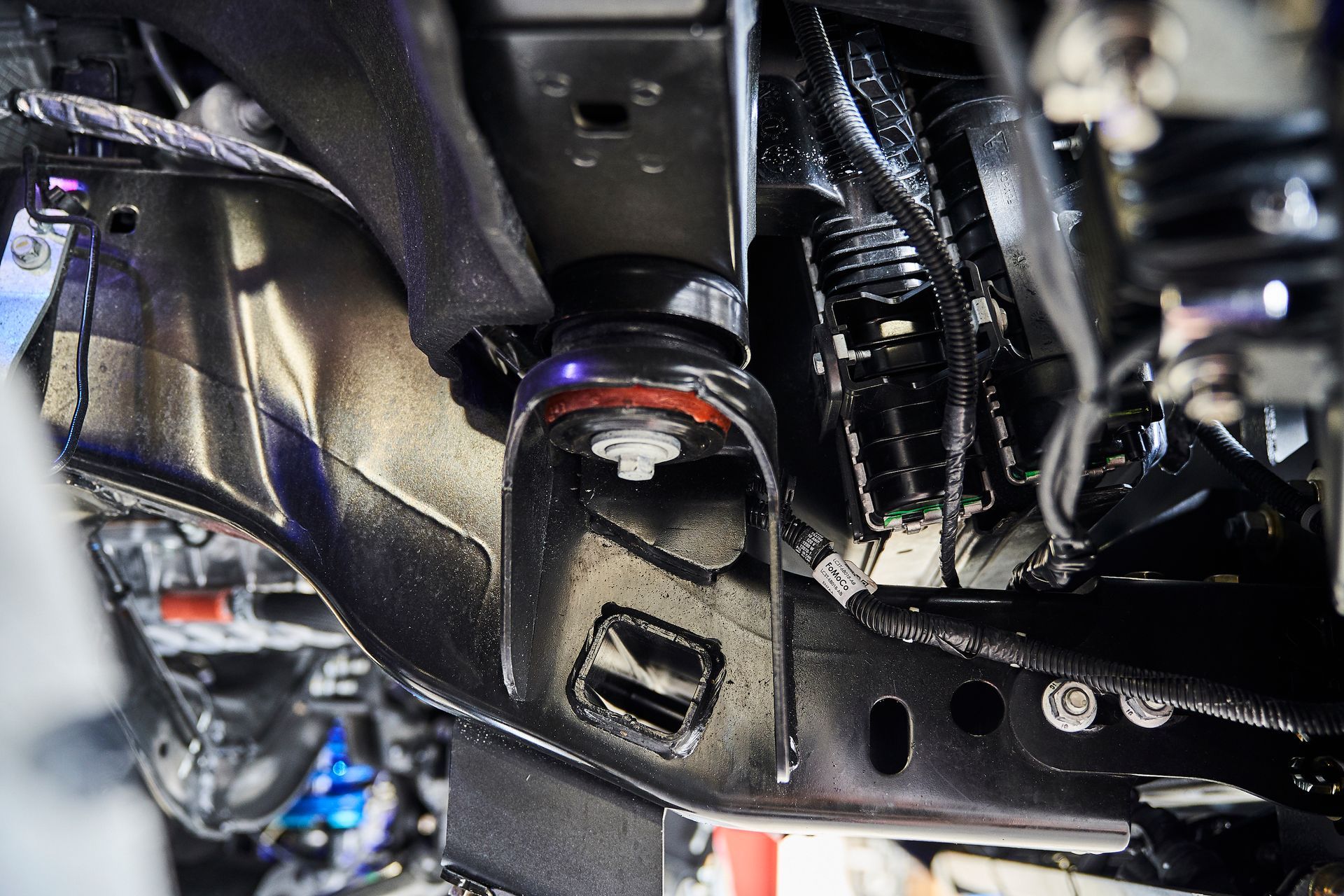 A close up of the underside of a car.