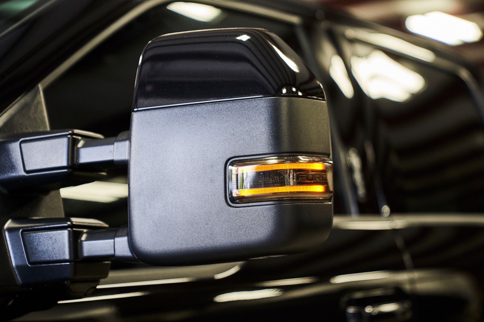 A close up of a side view mirror on a car