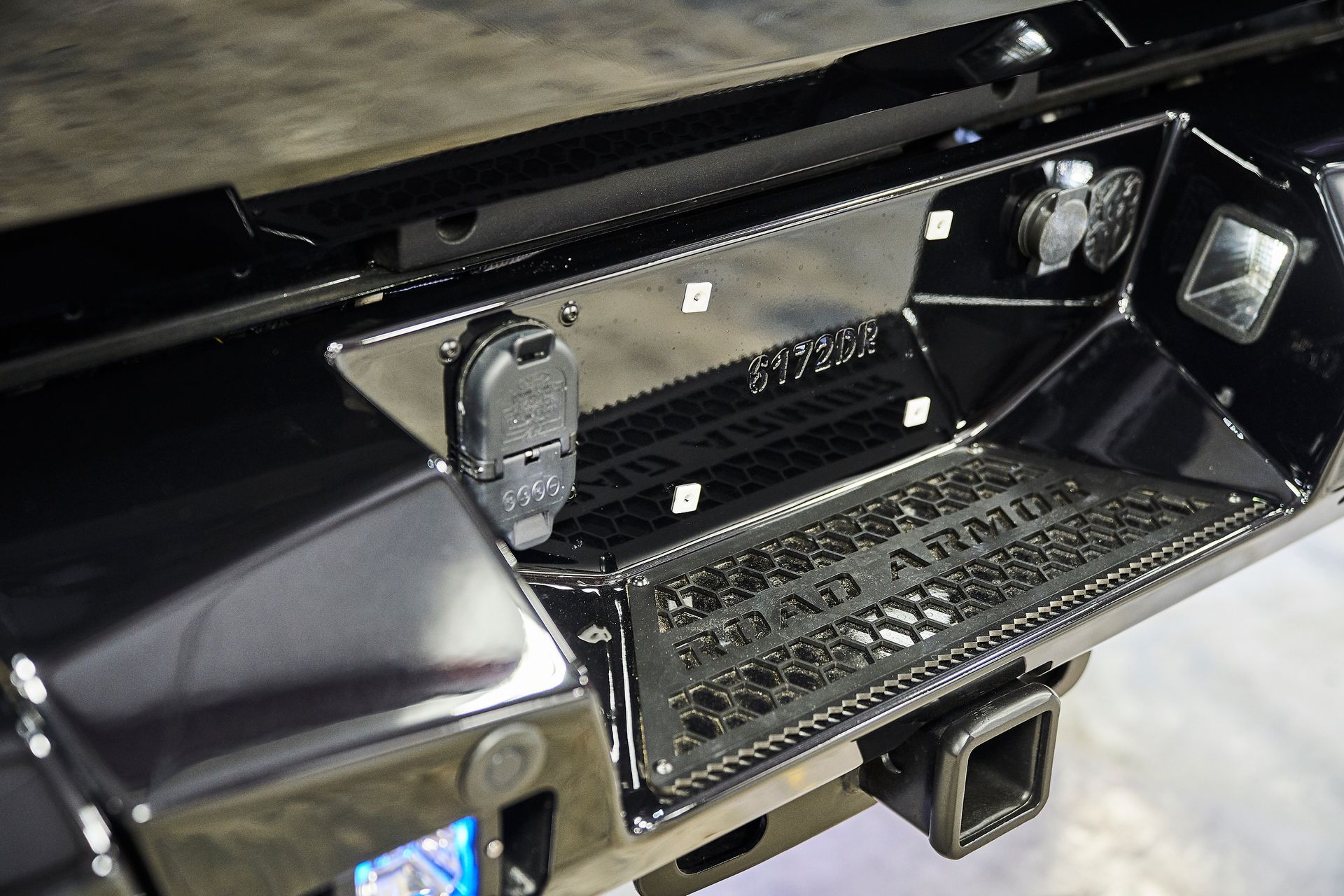 A close up of the back of a truck with a license plate
