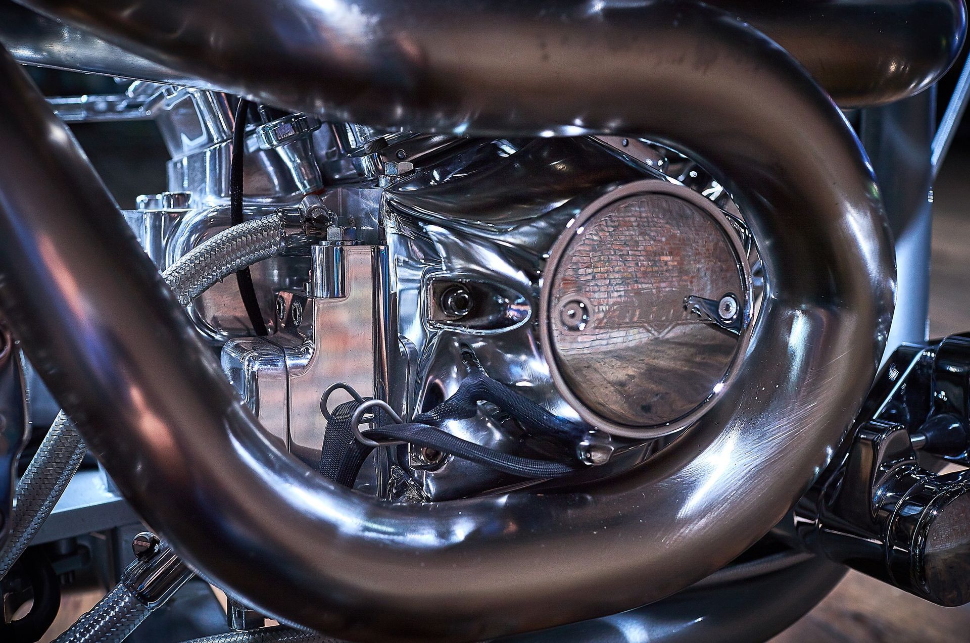 A close up of the engine of a motorcycle.