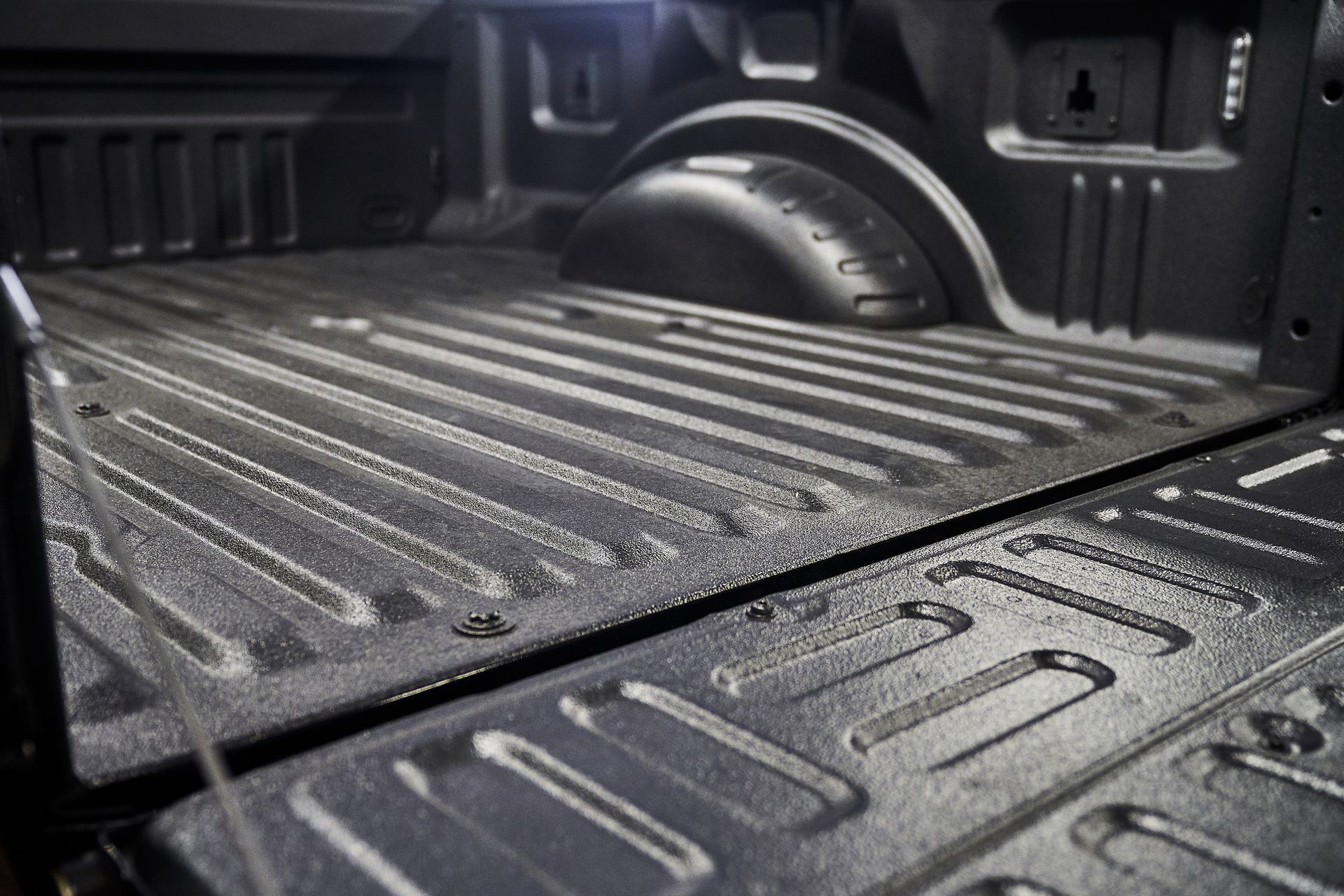 A close up of the back of a truck bed.