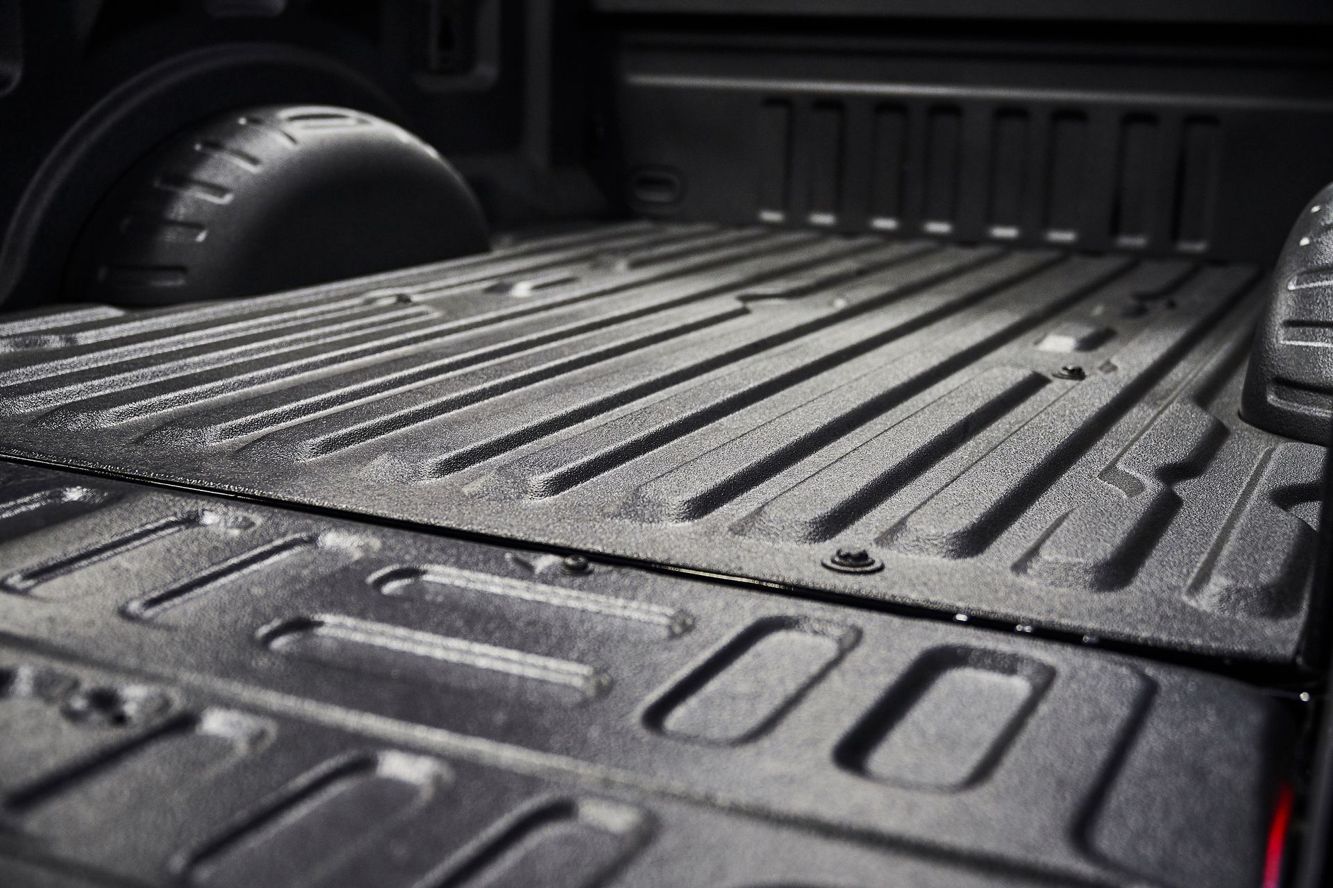 A close up of the back of a truck 's bed.