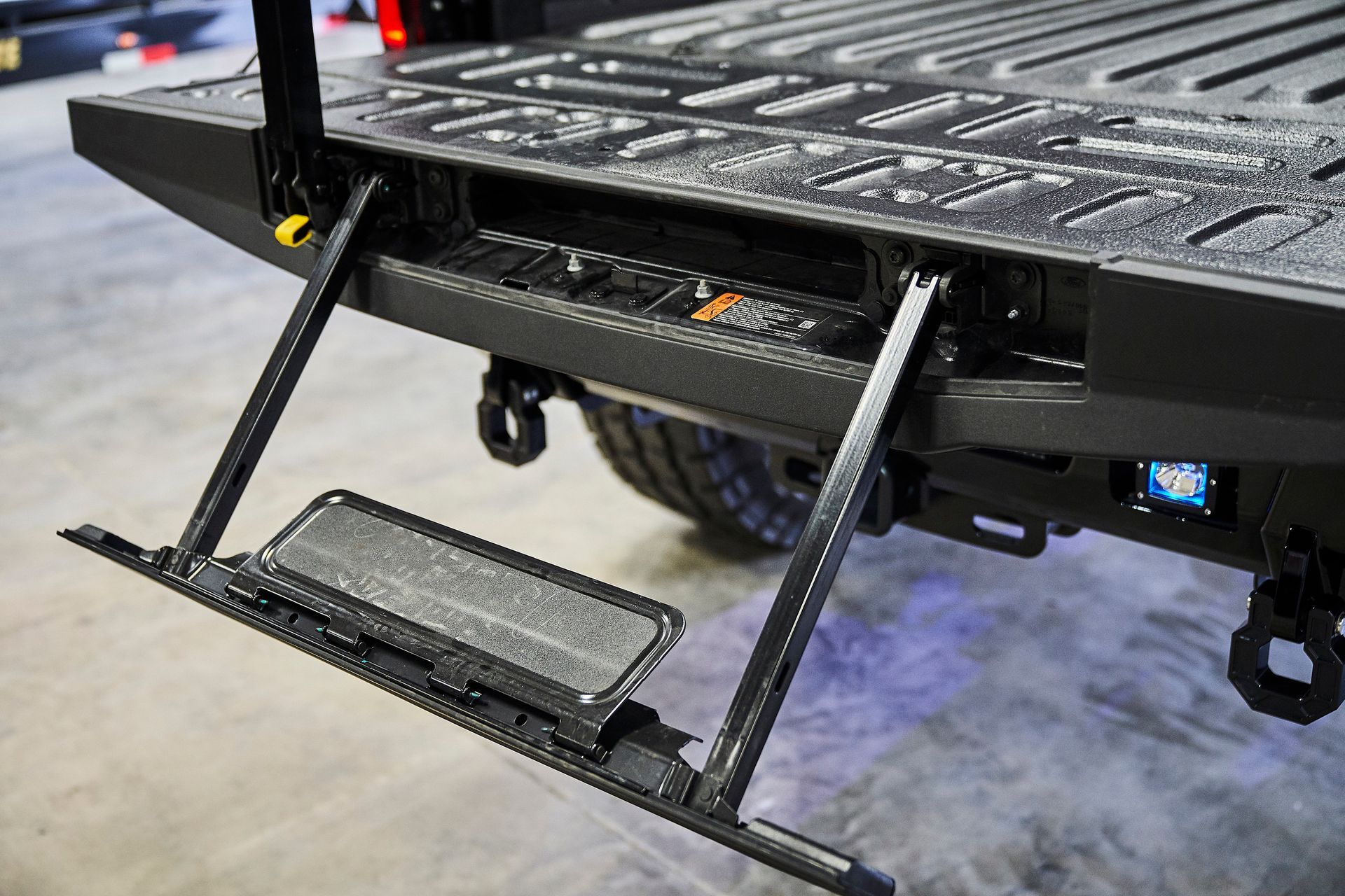 A close up of the back step of a truck.