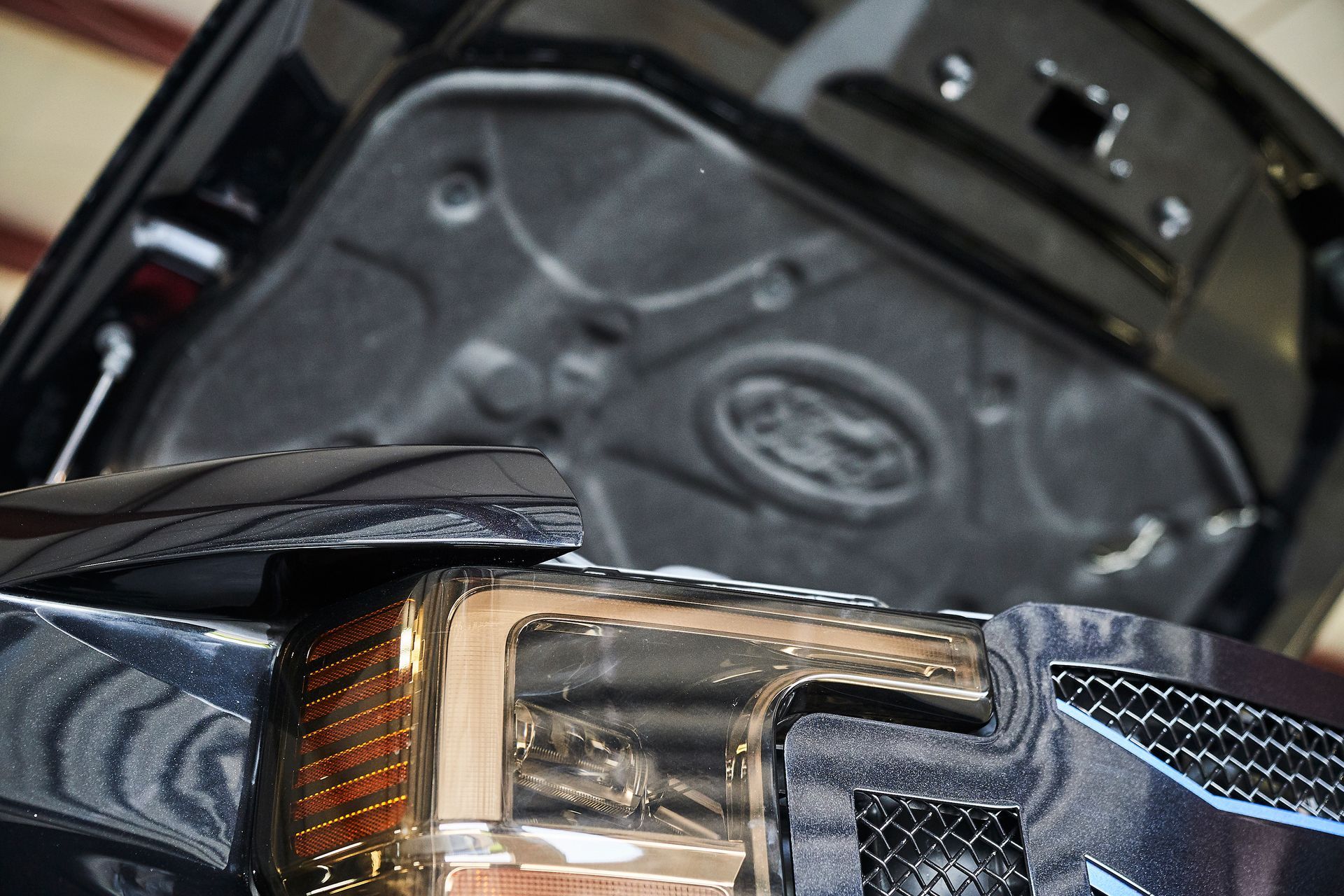 A close up of the hood of a car