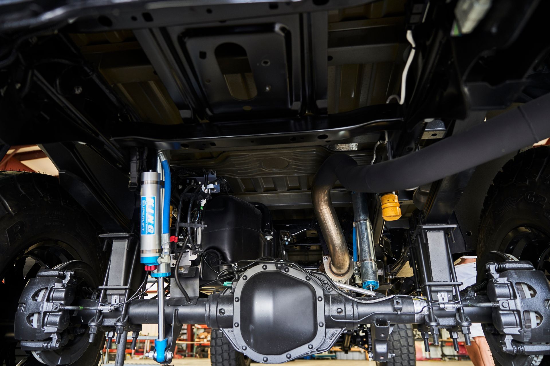 A close up of the underside of a truck.