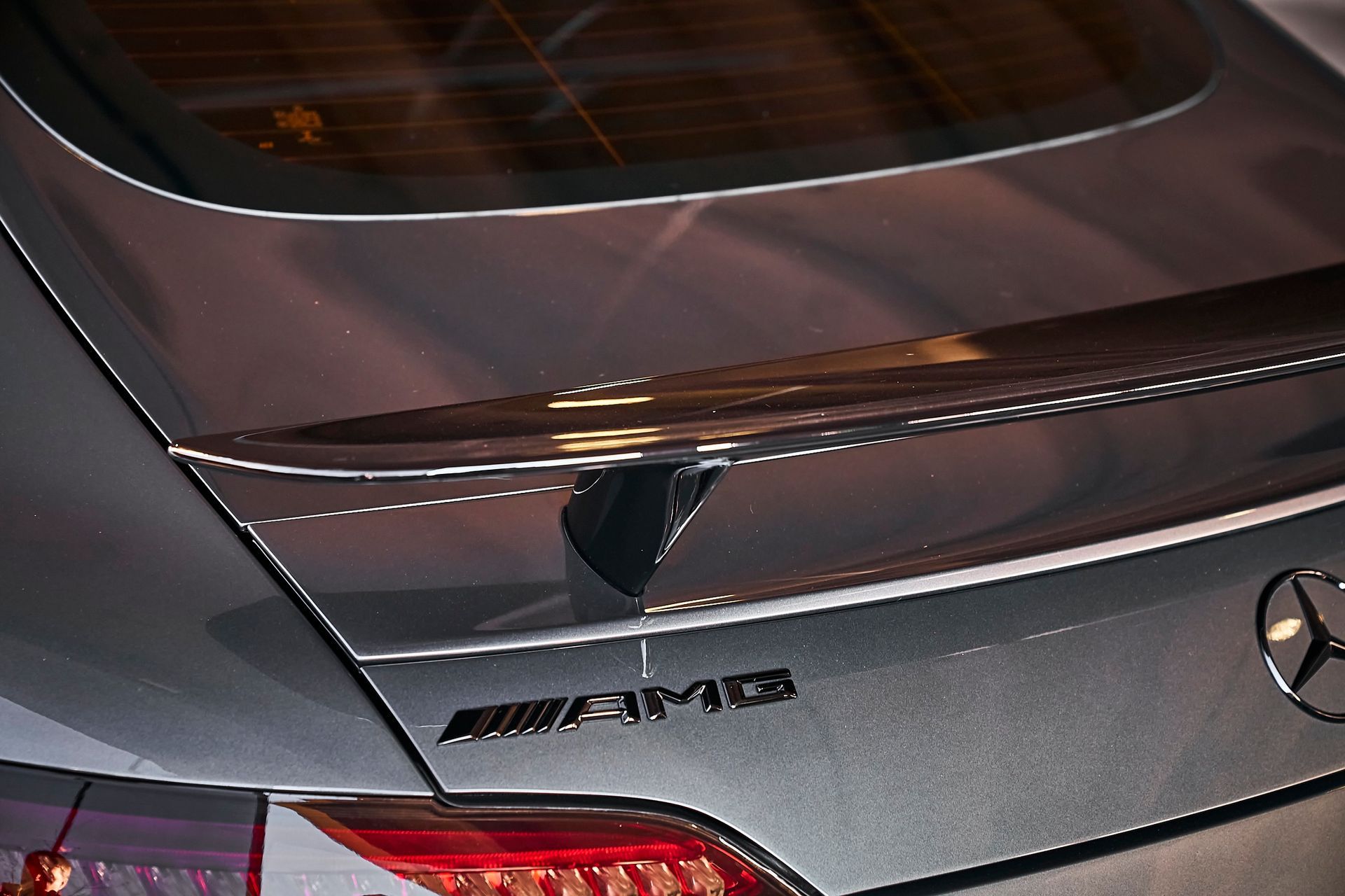 A close up of the rear end of a mercedes amg