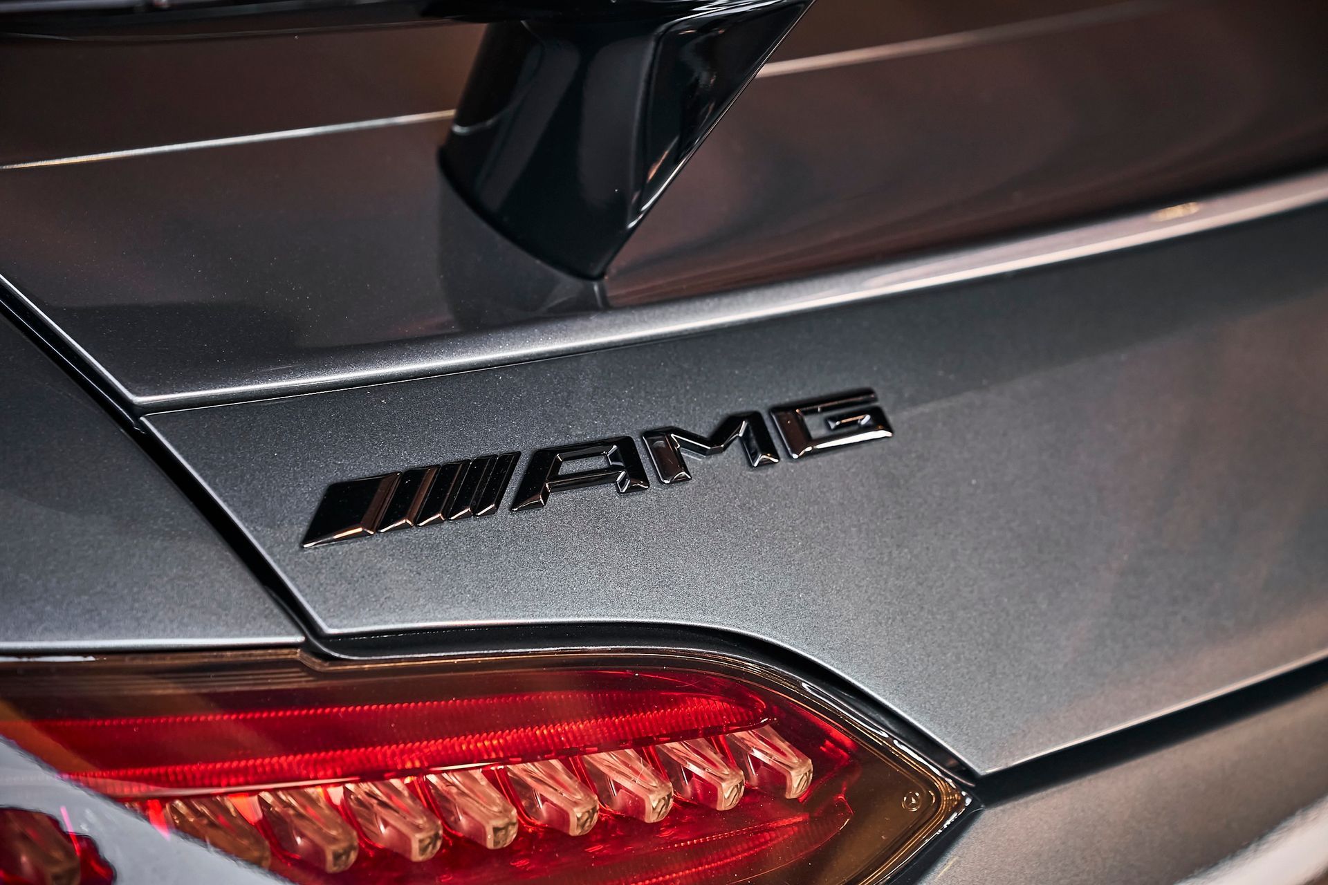 A close up of the back of a mercedes amg car