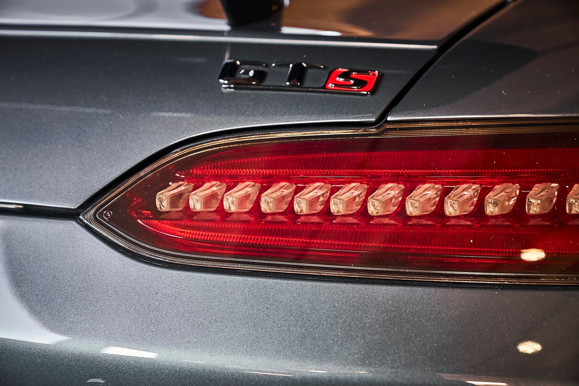A close up of a car with the word gts on it