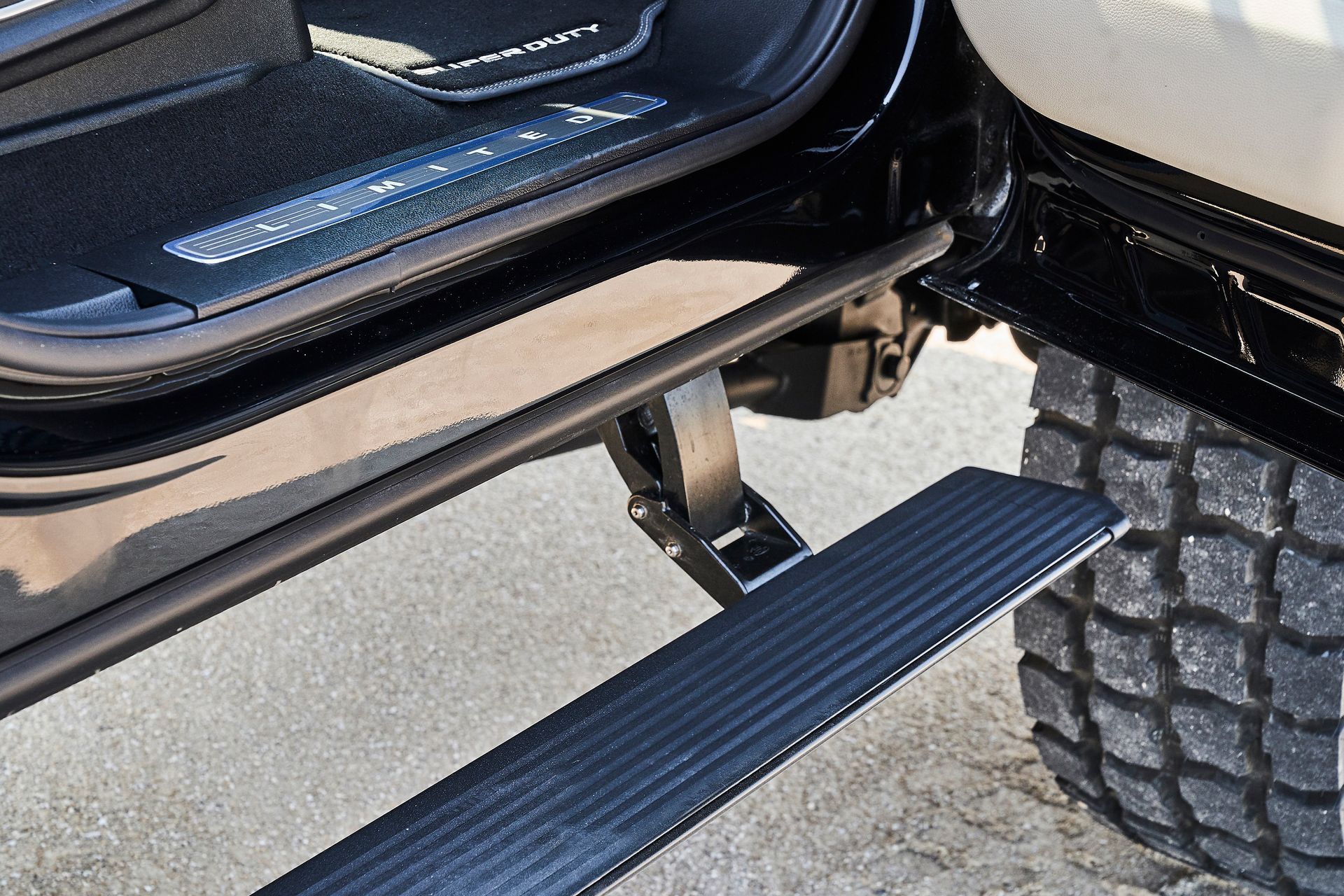 A close up of a side step on a car