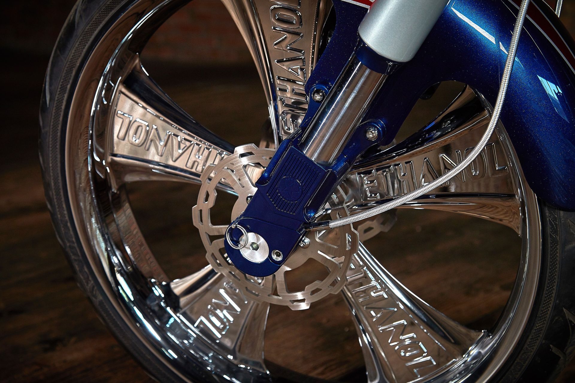 A close up of a motorcycle wheel with the word torque on it