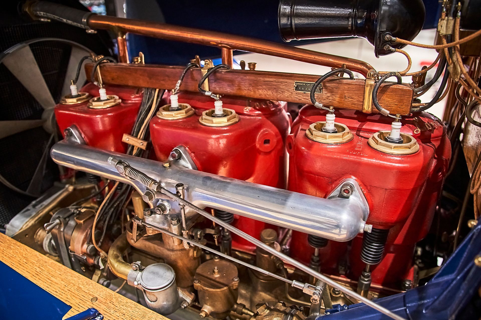 A close up of the engine of an old car