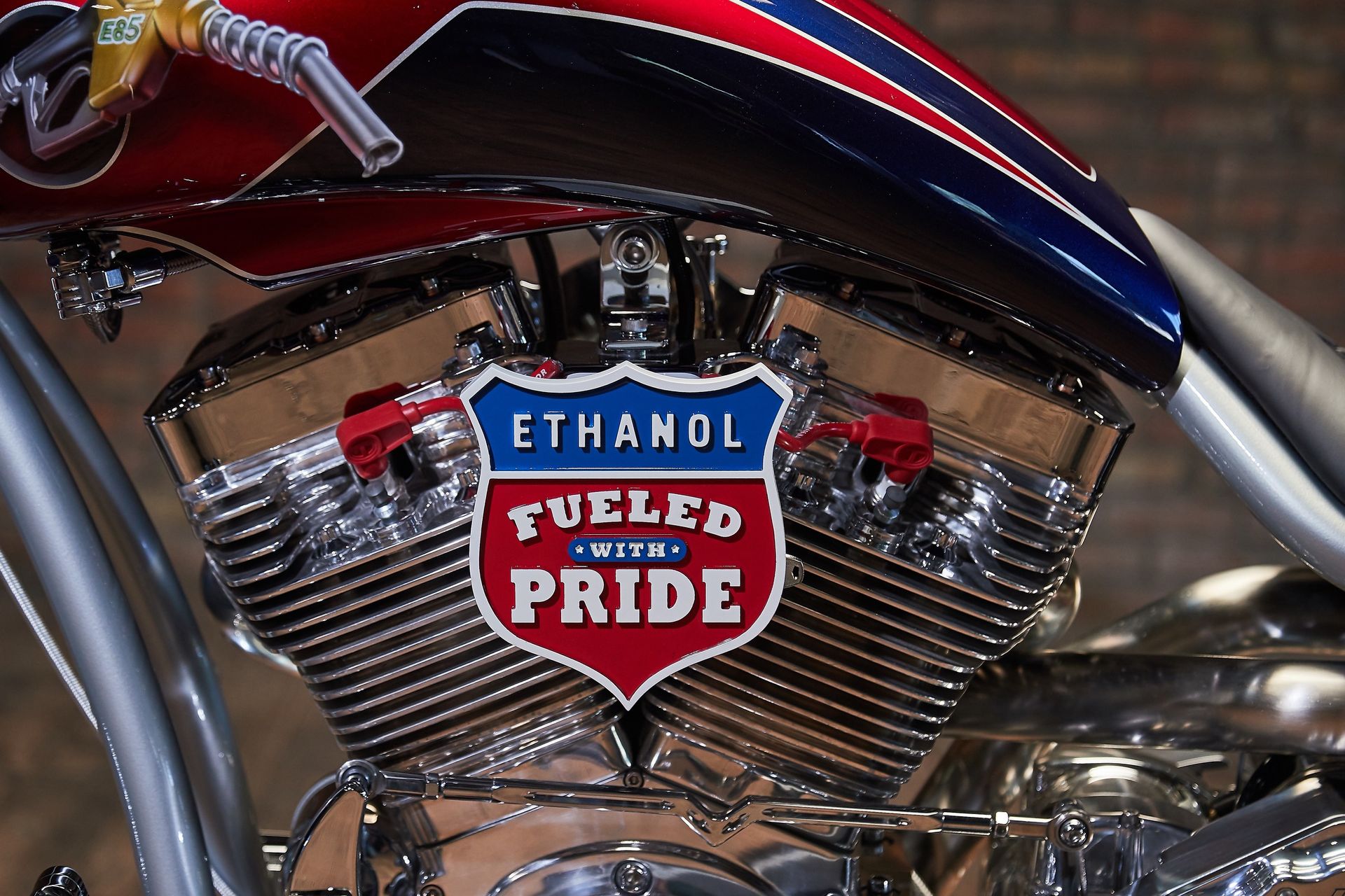 A close up of a motorcycle engine that says ethanol fueled with pride