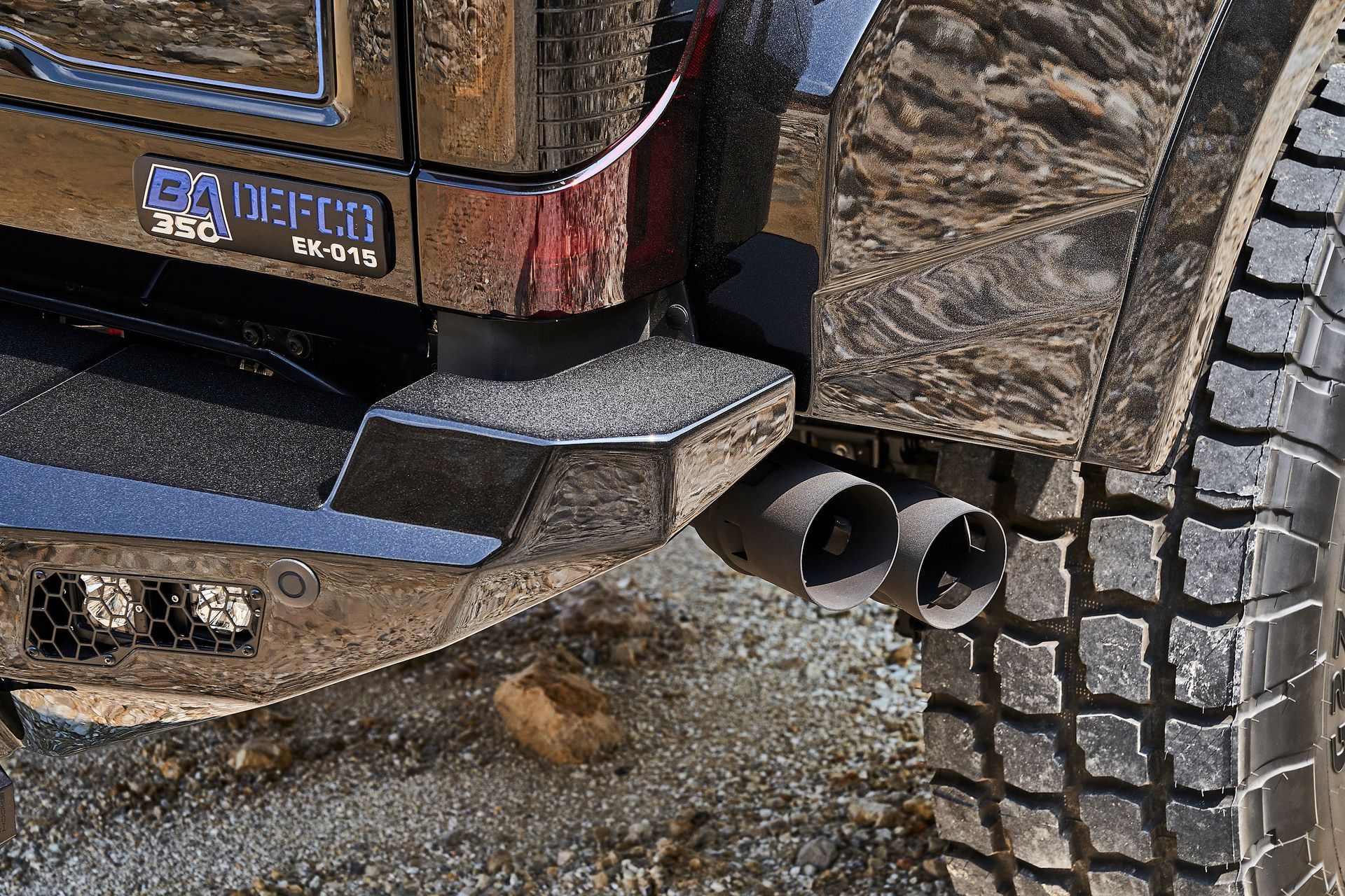 A close up of the exhaust pipe of a jeep