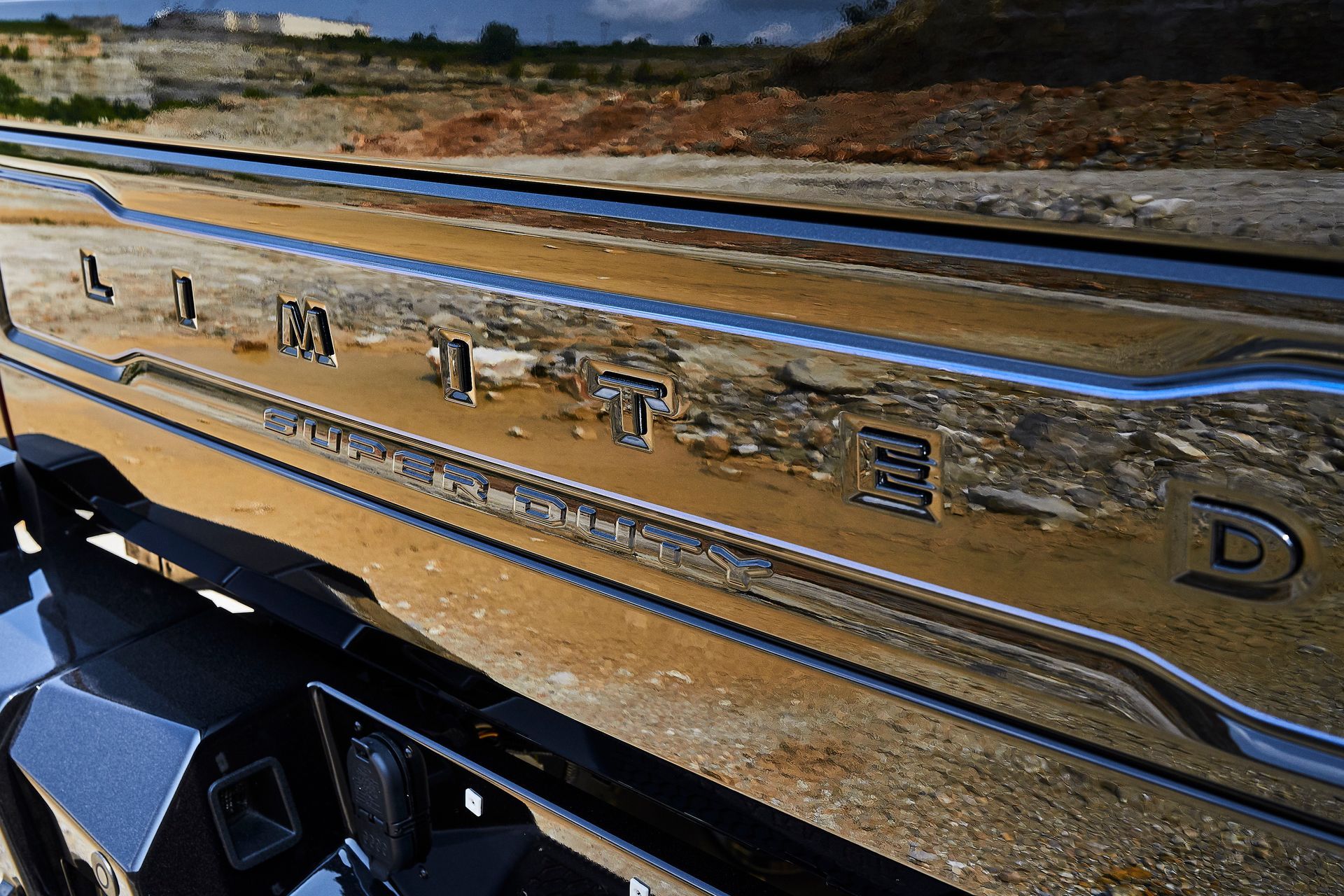 A close up of the back of a dodge ram truck