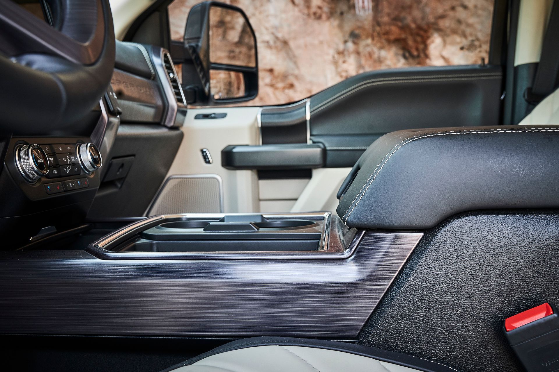 A close up of the interior of a ford f150 truck.