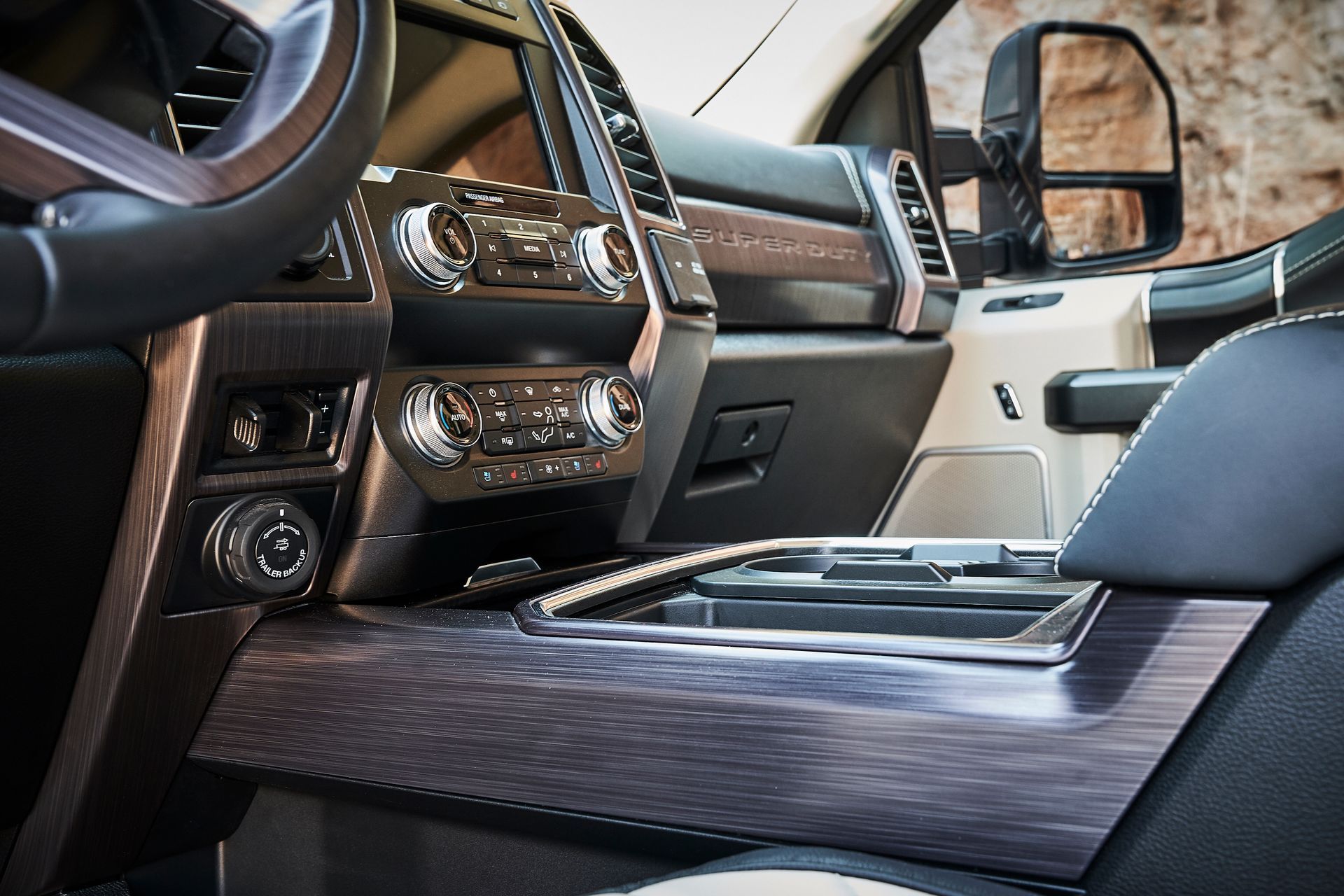 A close up of the interior of a ford f150 truck.