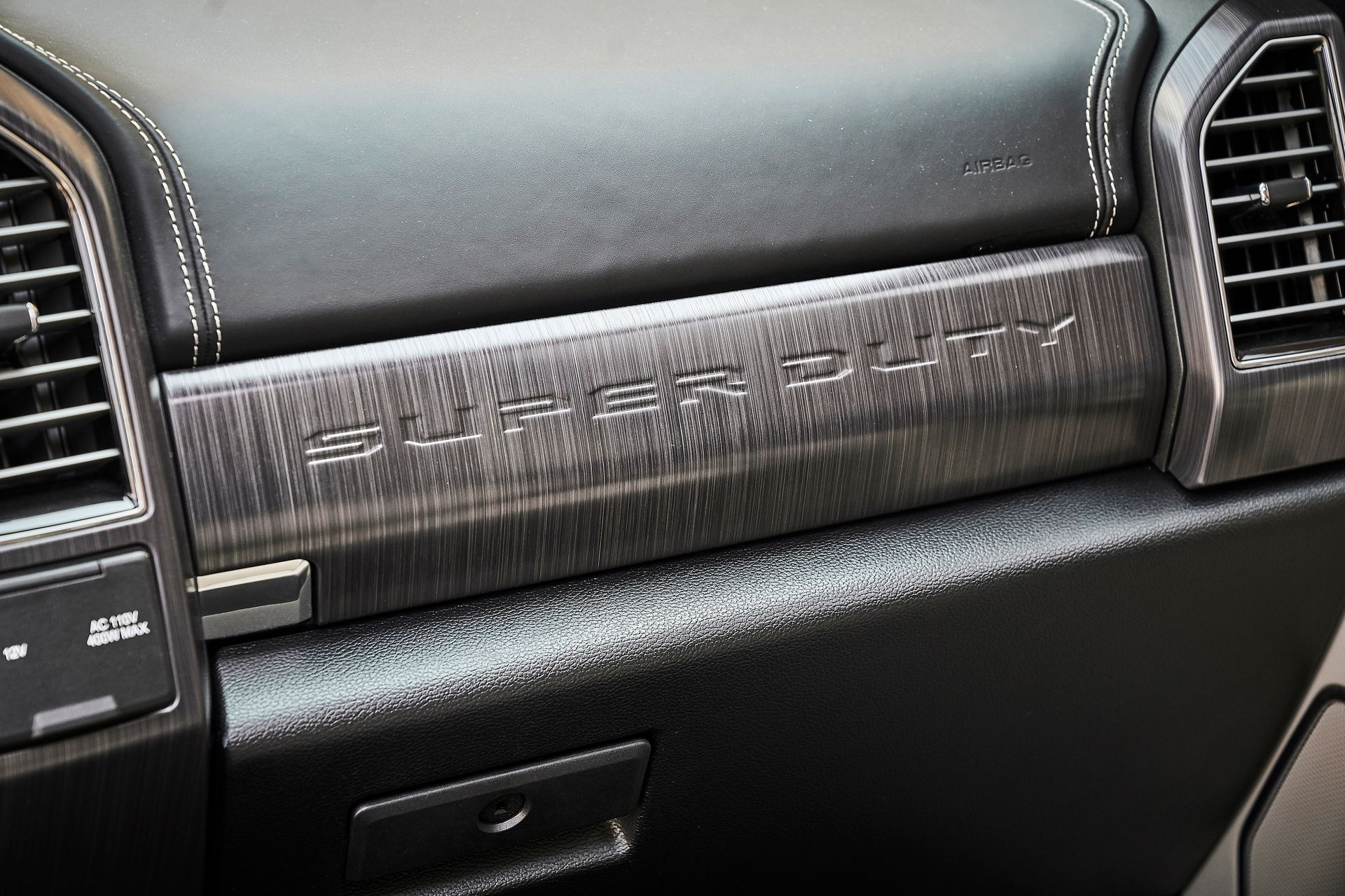 A close up of the dashboard of a ford super duty truck.