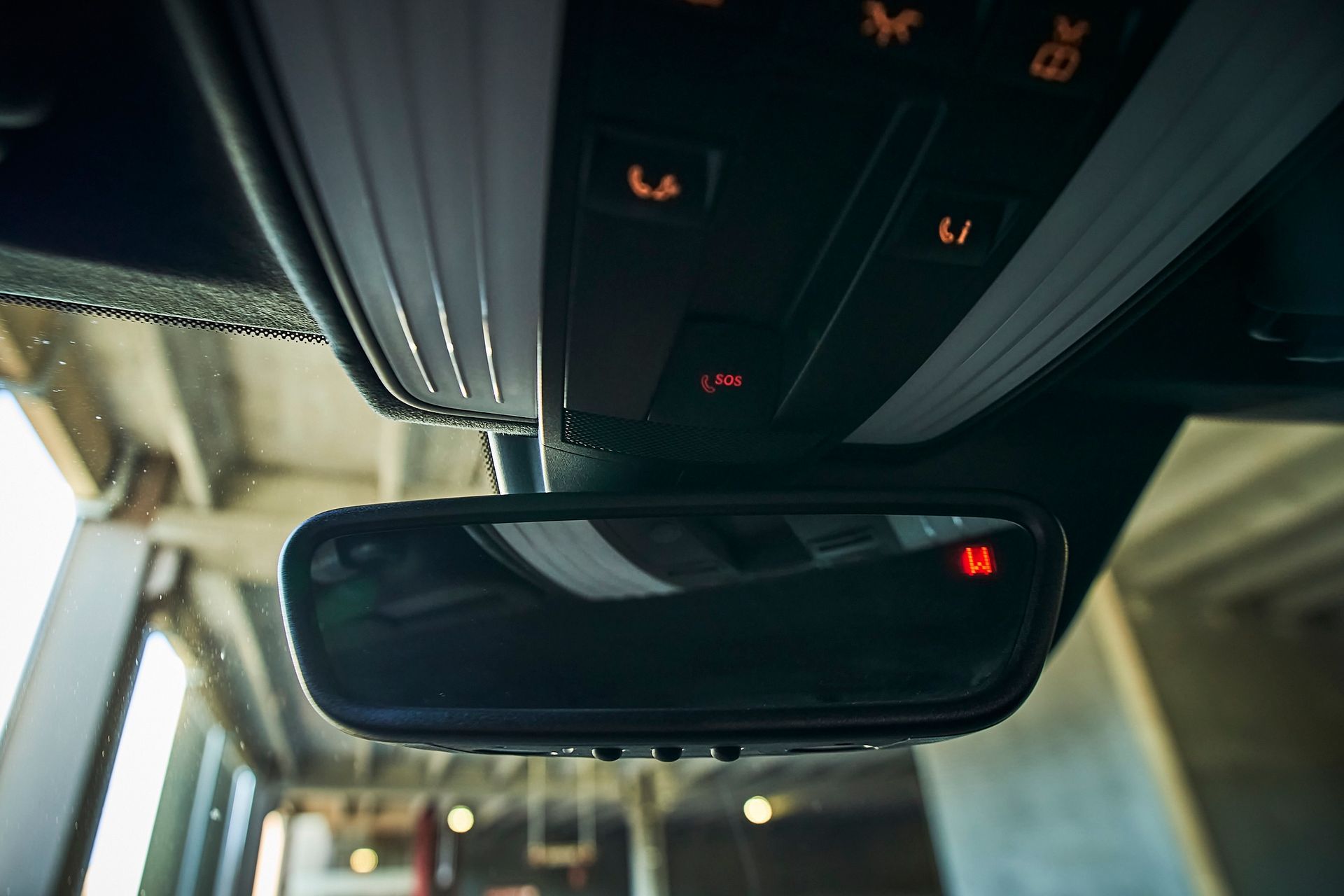 A close up of a rear view mirror in a car.