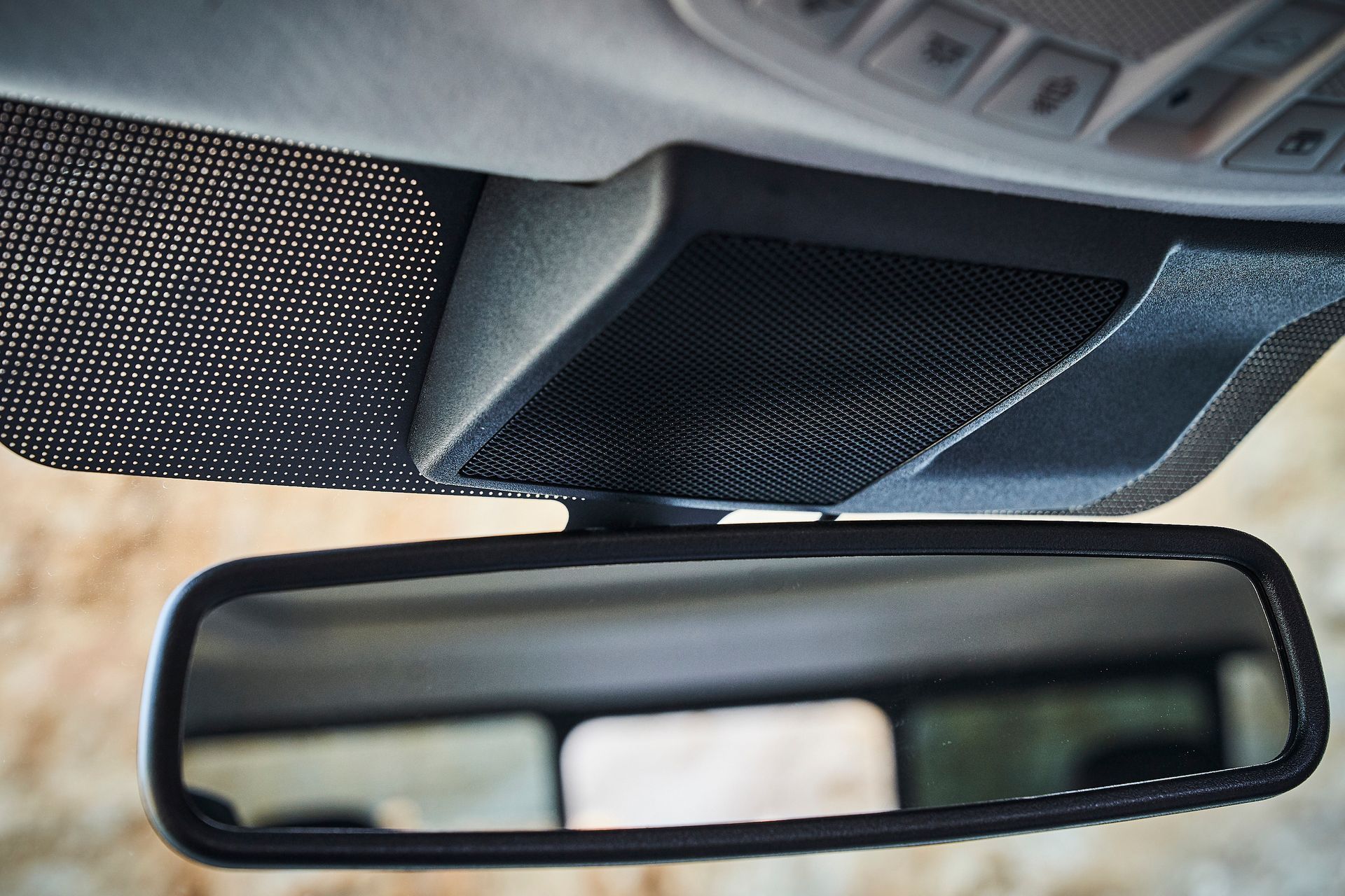 A close up of a rear view mirror in a car