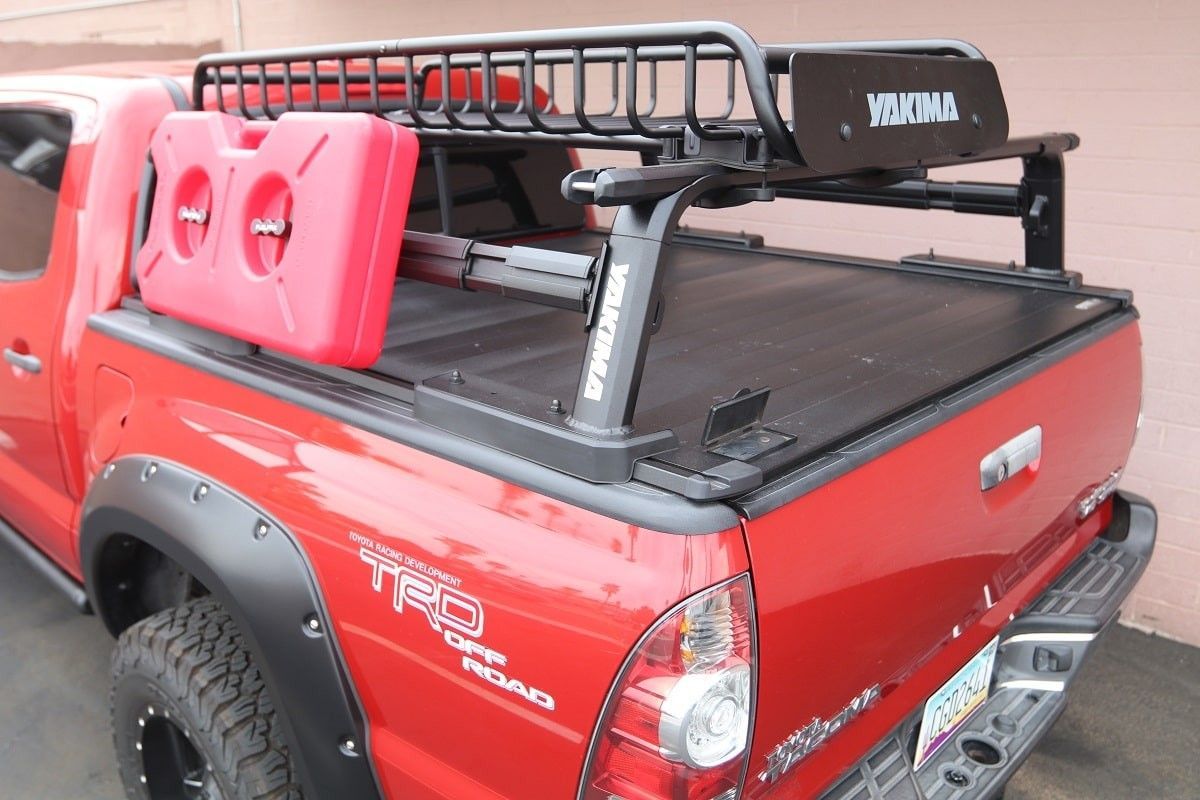 White pickup truck with a black utility rack.